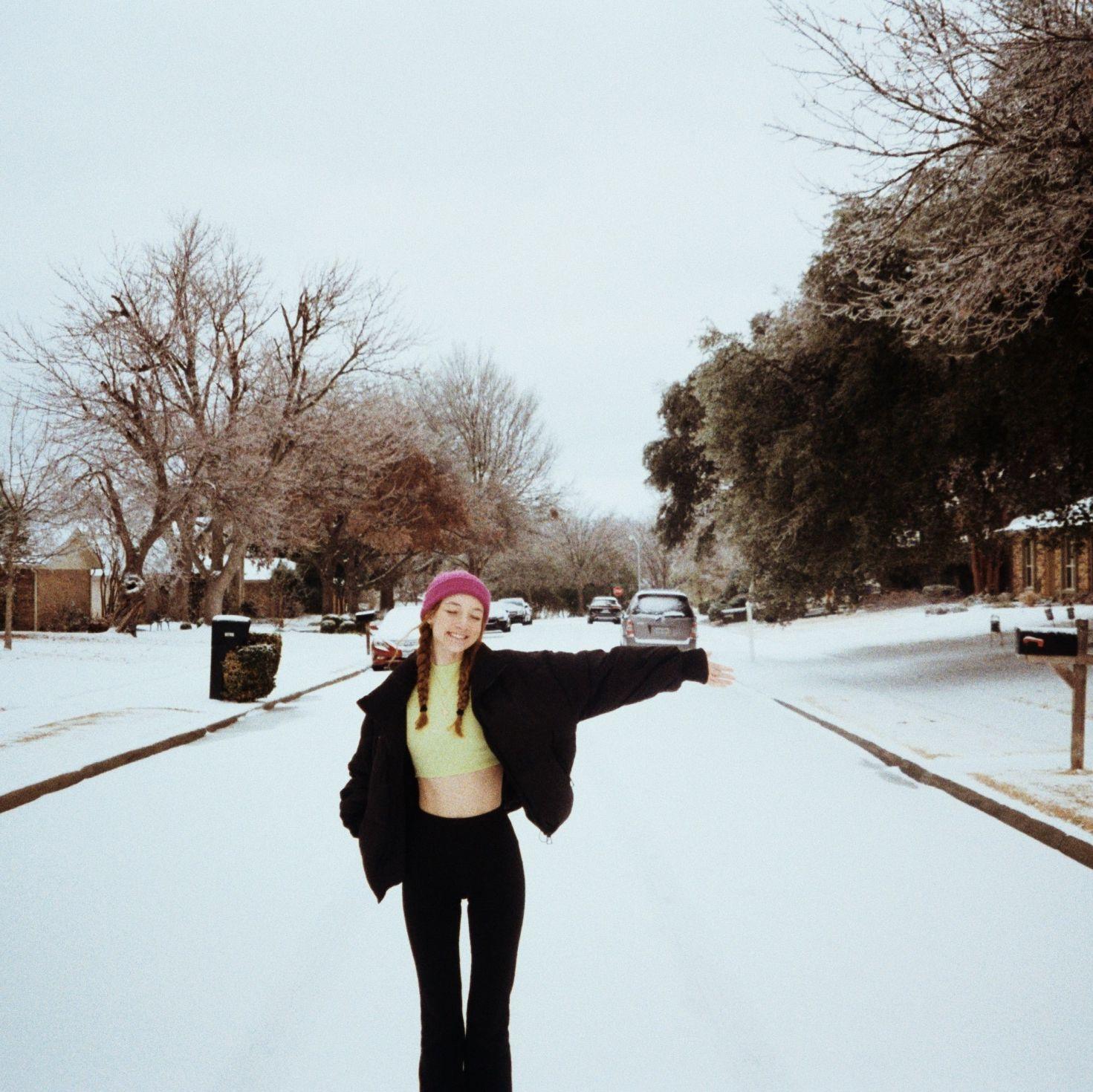Snow days in Marcus's Plano neighborhood! Courtney has always loved the cold, and ever since meeting Marcus, she has been lucky enough to experience a snow day at least once a year. It's her favorite!