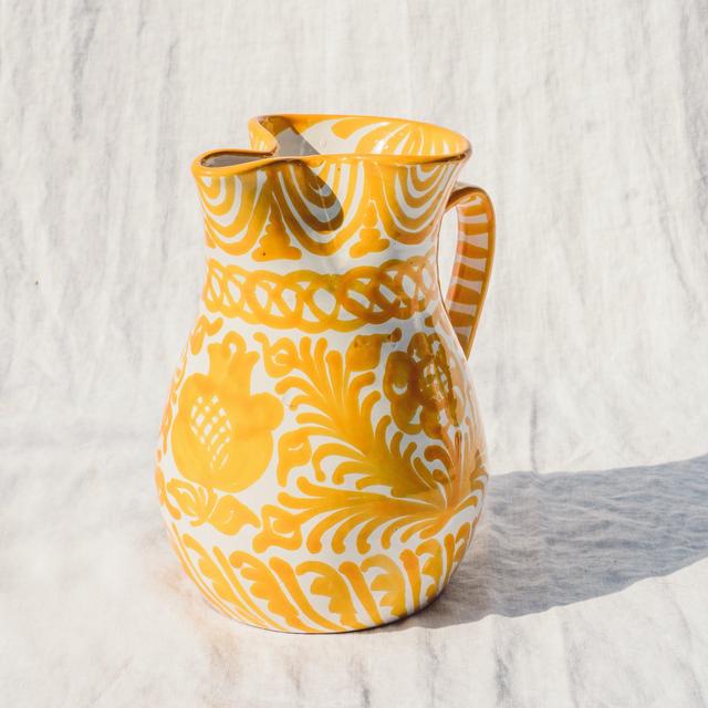 Medium pitcher with hand painted designs