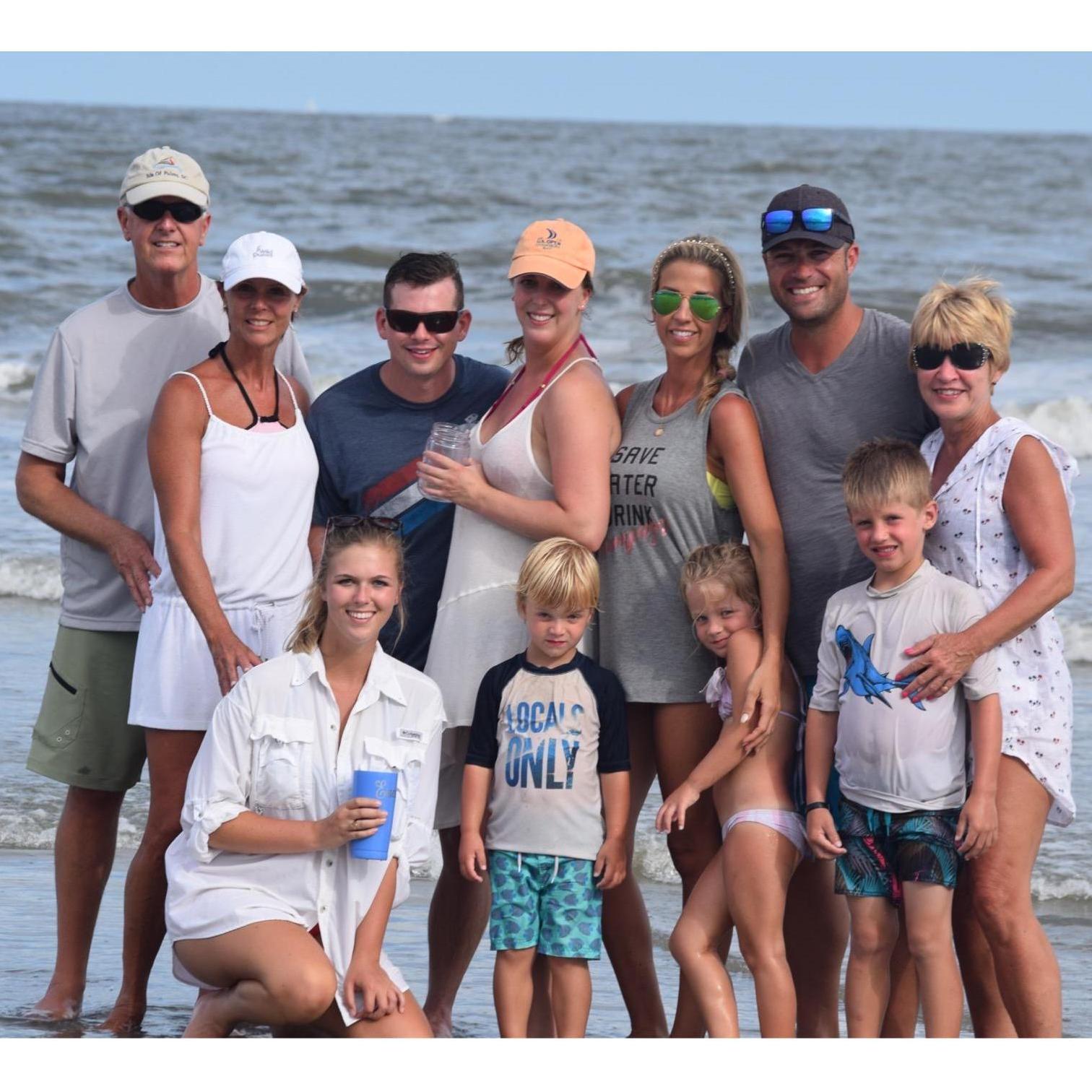 Beach day with our matron of honor, groomsman, junior groomsman, flower girl, and ring bearer!