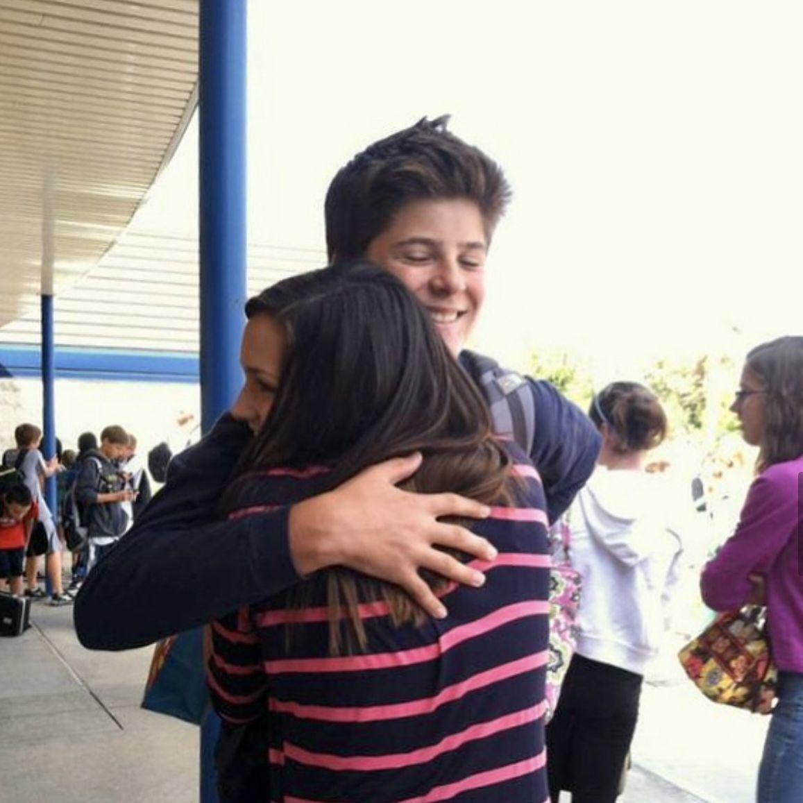 In middle school we would hug before getting on our buses to go home... young love!