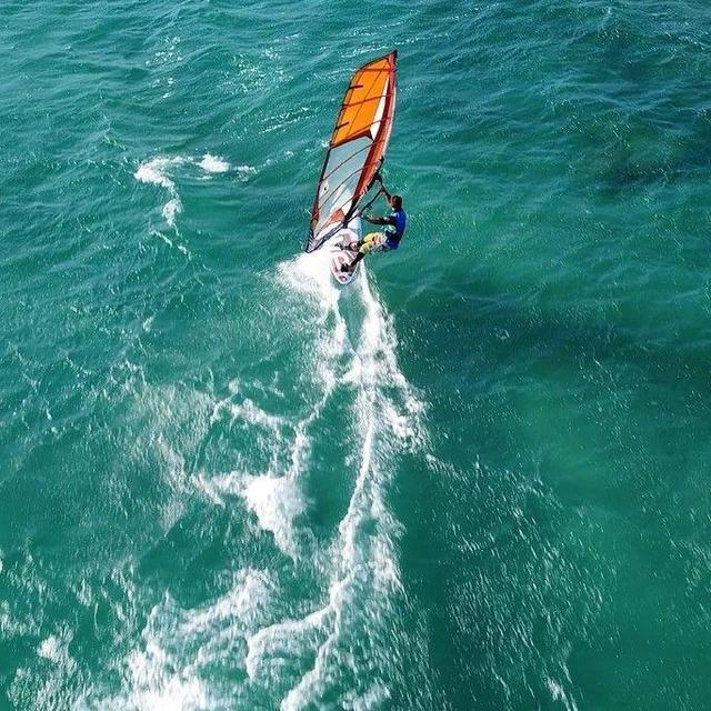 Honeymoon experience: wind surfing for a day in Golden Beach, Paros, Greece