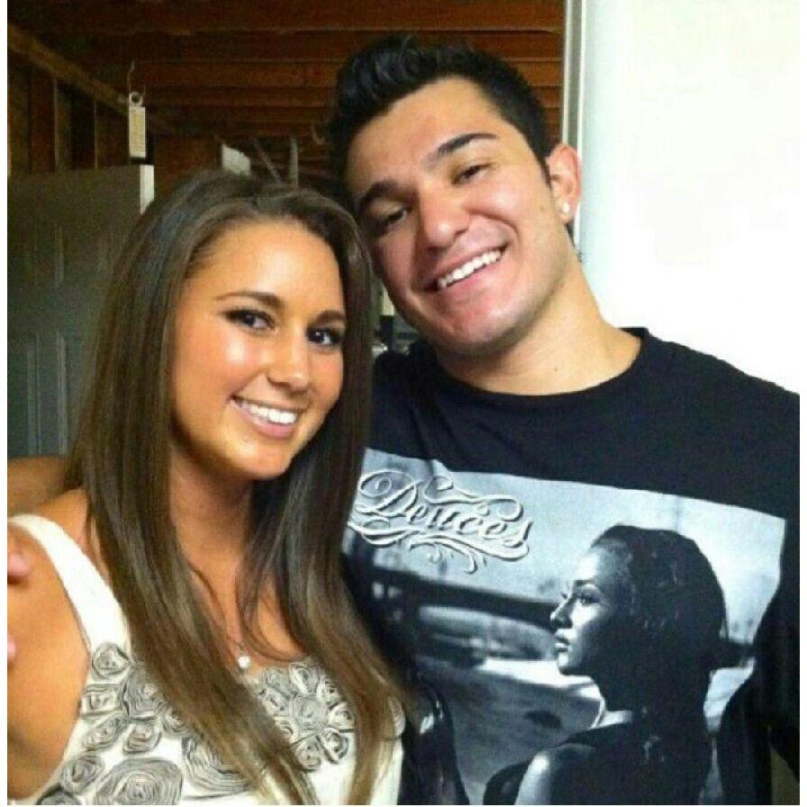 The day we met and he insisted we take a picture together.... a few hours late he told me he was going to marry me. Almost 7 years later and we are about to tie the knot!