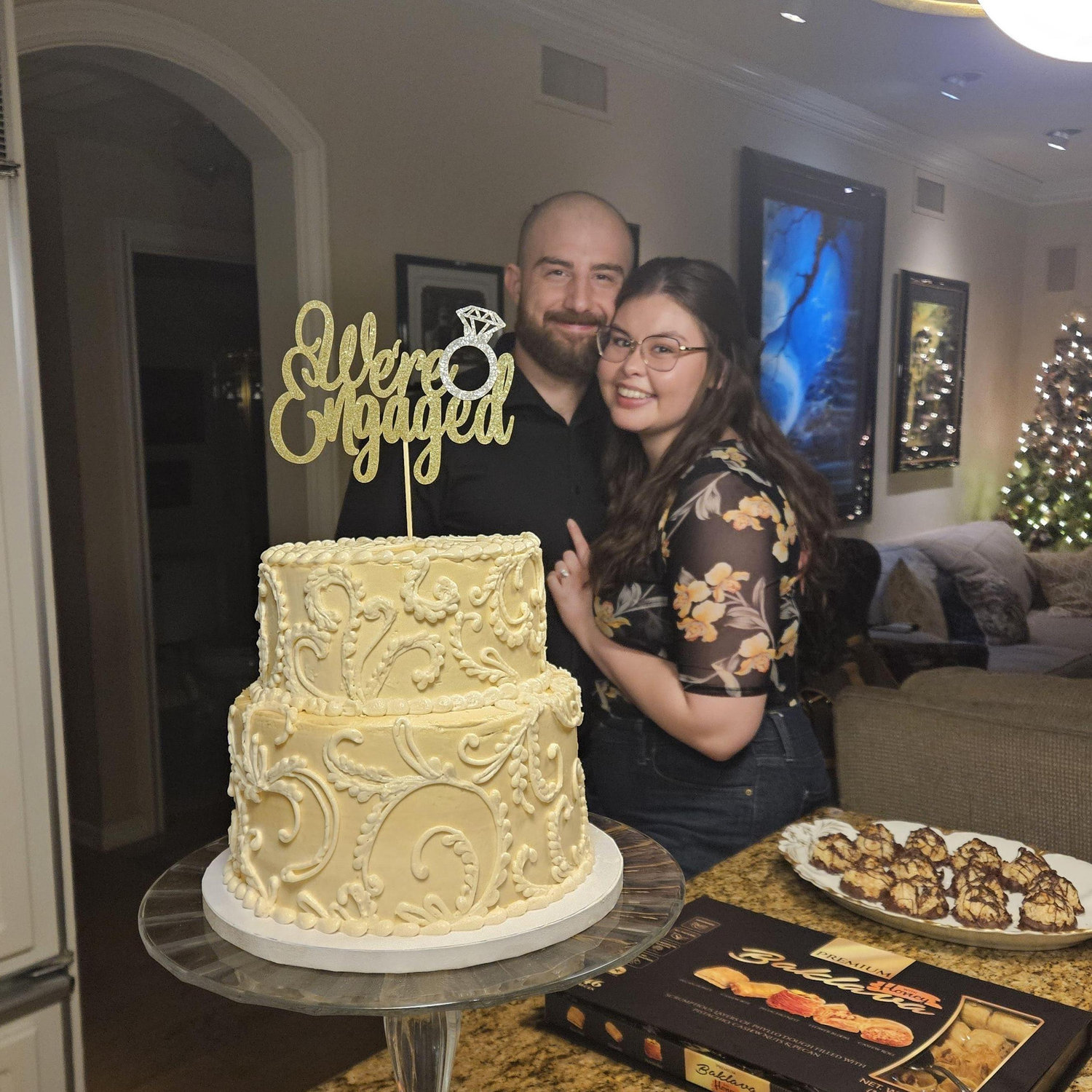 A surprise engagement celebration cake with Troy's family in California