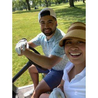 Golfing in our first golf scramble together