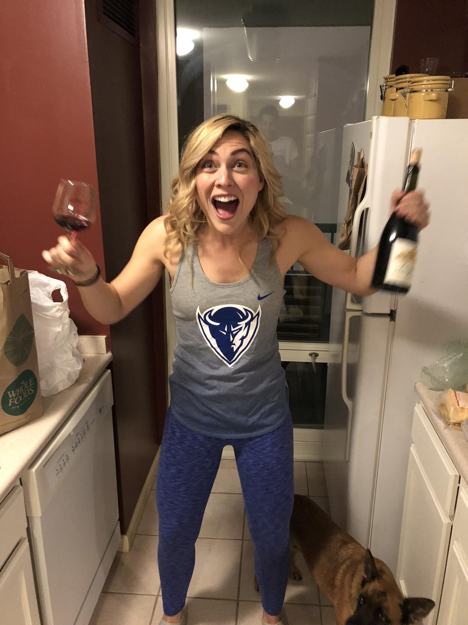 Two of Anna's favorite things: comfy pants and Beaujolais