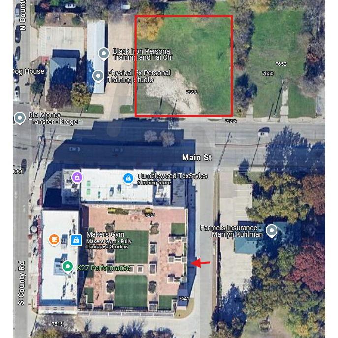 The red arrow shows the parking lot entrance and the red box indicates overflow parking.