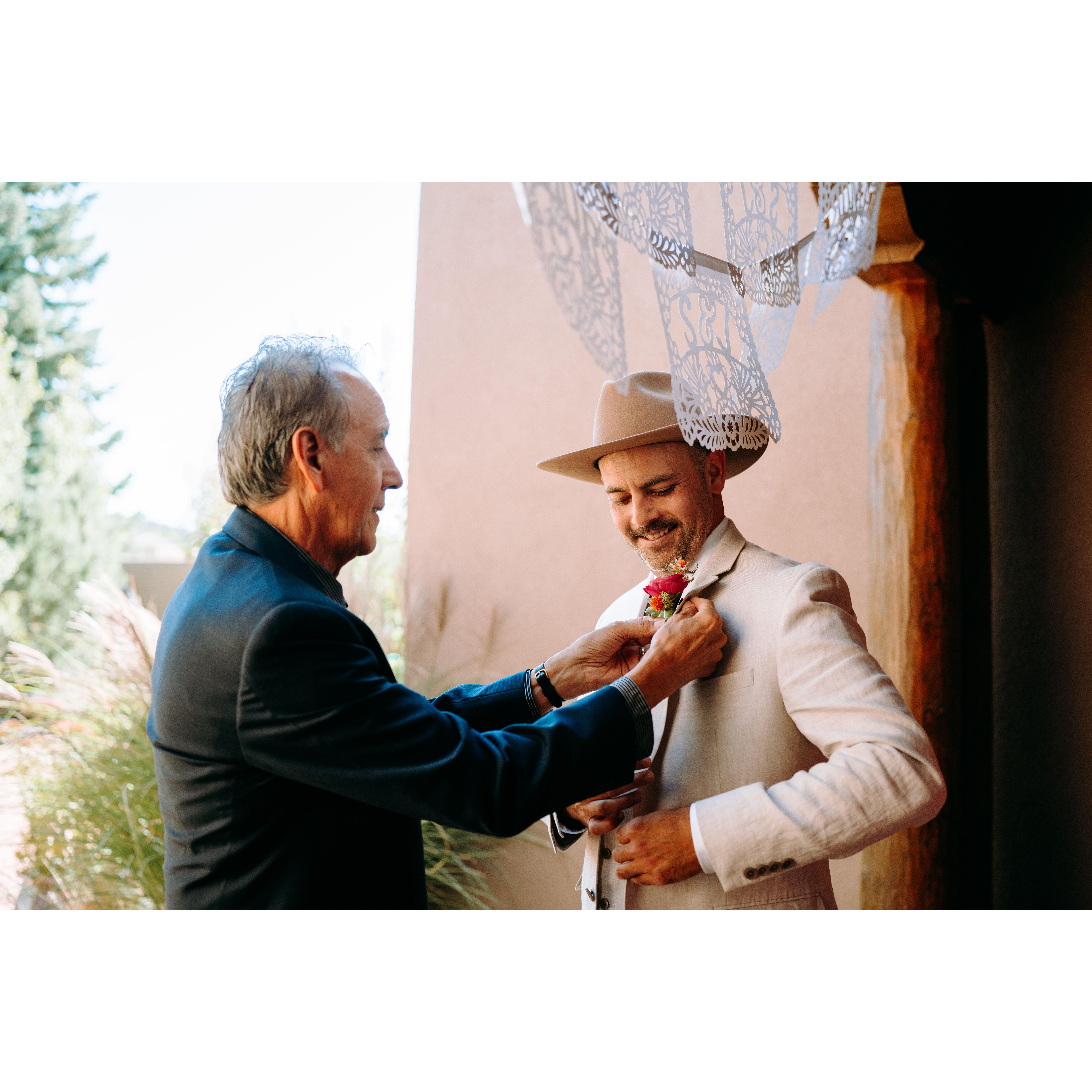 Ric (Shae's Dad) and Shae pinning a boutonniere