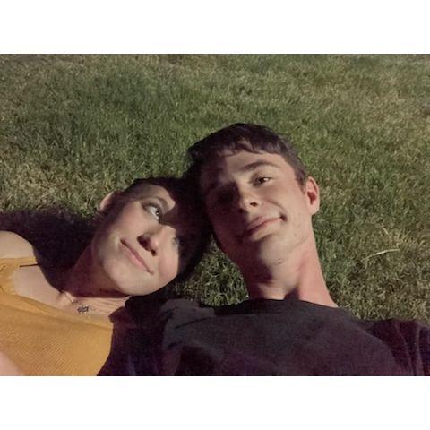 Sitting on a wood bench outside my house, I threw myself off while holding onto Kyle. We landed in the grass together, and soon after pronounced that we were going to get married.