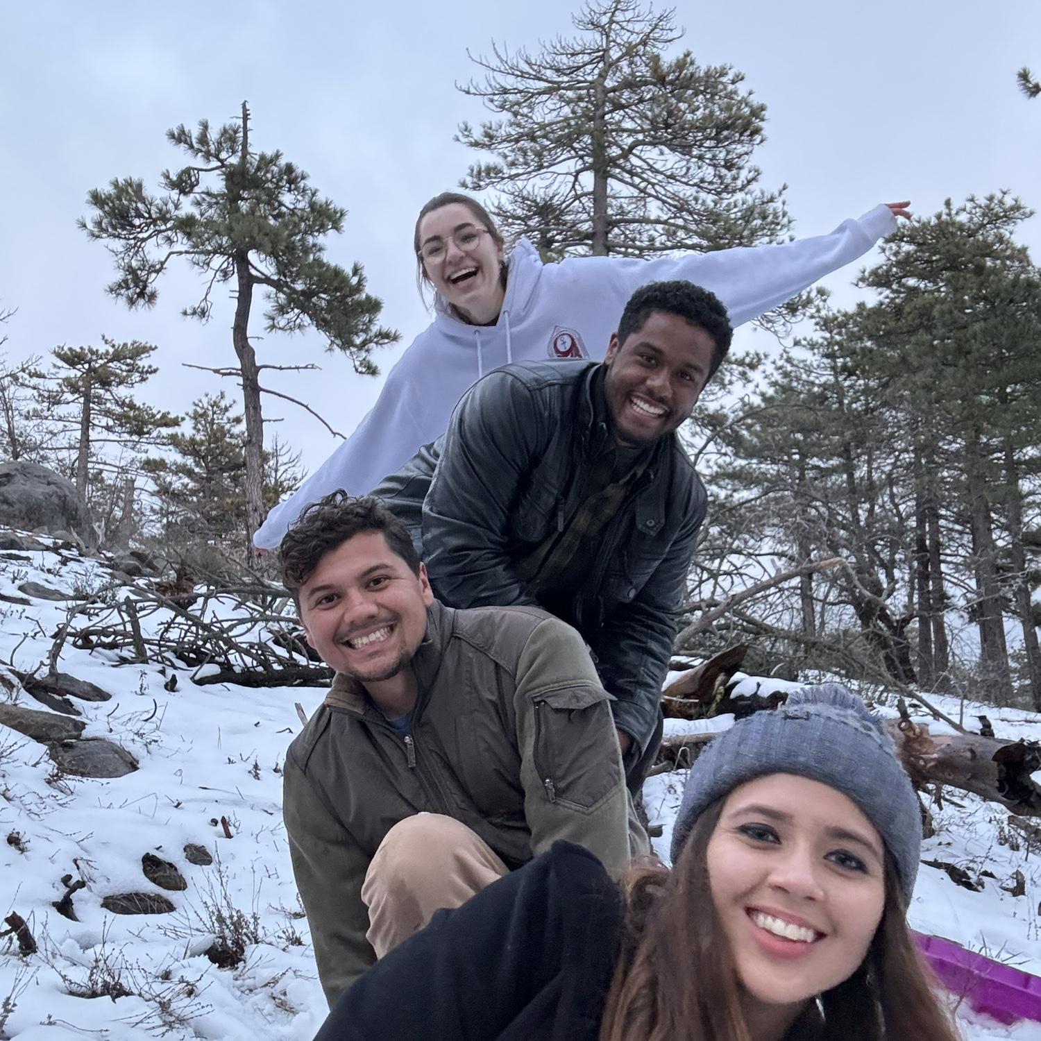 Stacy, DJ, Augi, and Gigi finding somewhere to go sledding