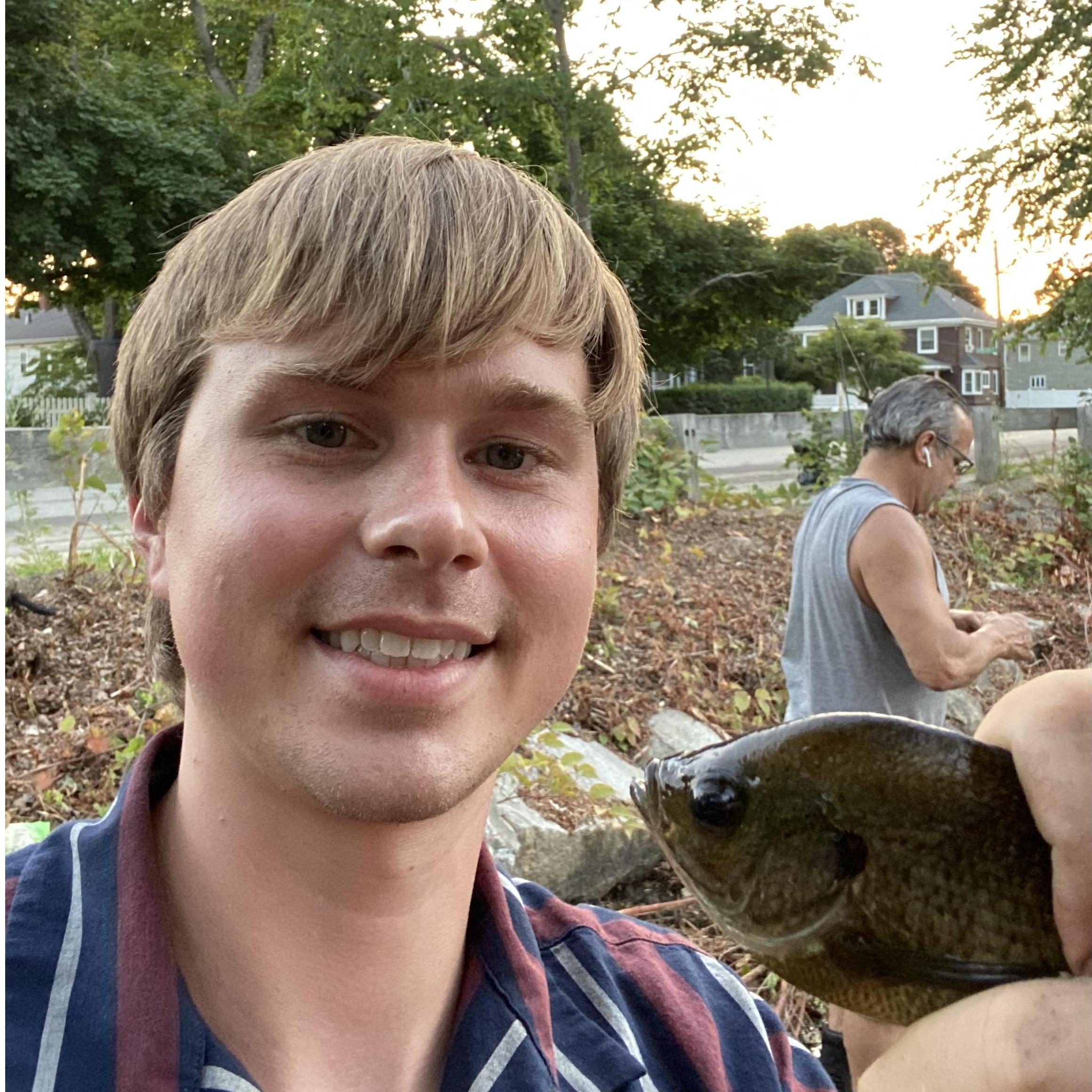 Right before Jake asked Mackenzie's dad (pictured behind Jake's big catch) for his blessing to propose