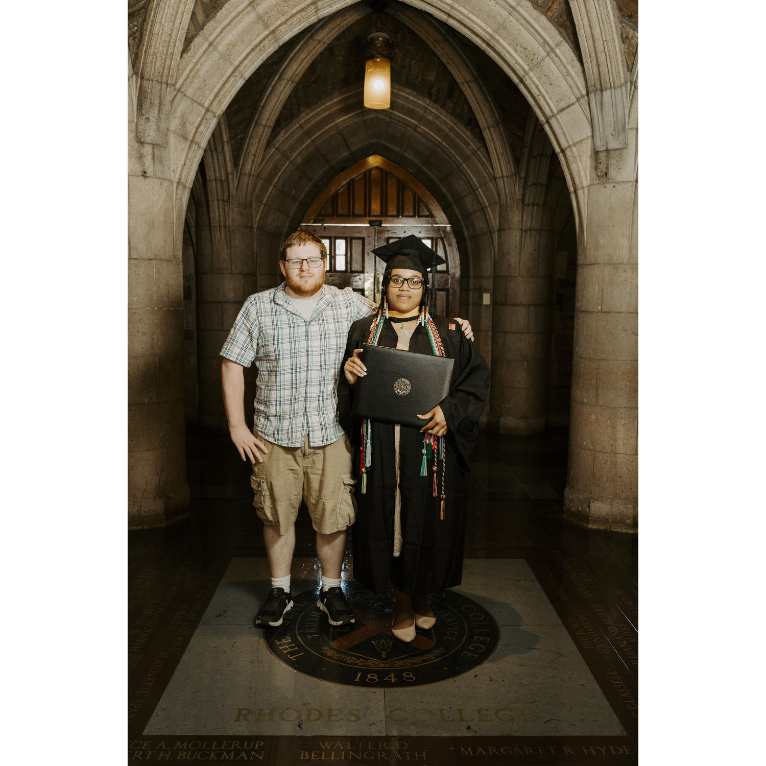 Seven years into our relationship, we became a college-educated couple!