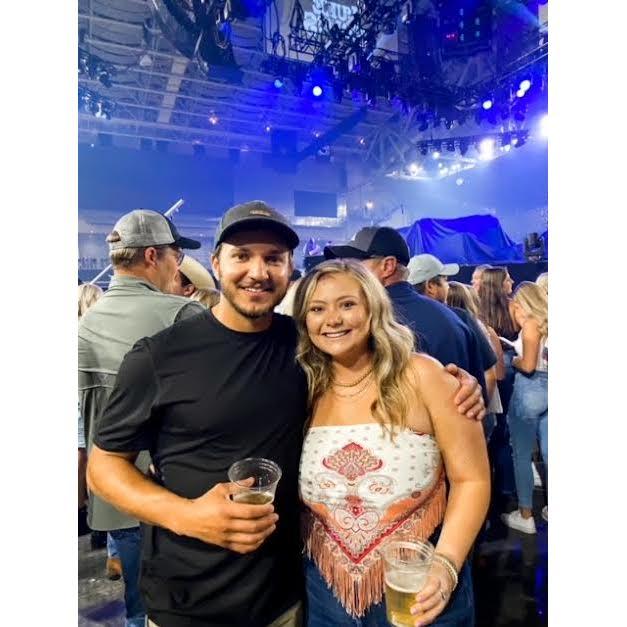 We love concerts! This is one of our favorites we've been to together, Luke Combs in Grand Forks!