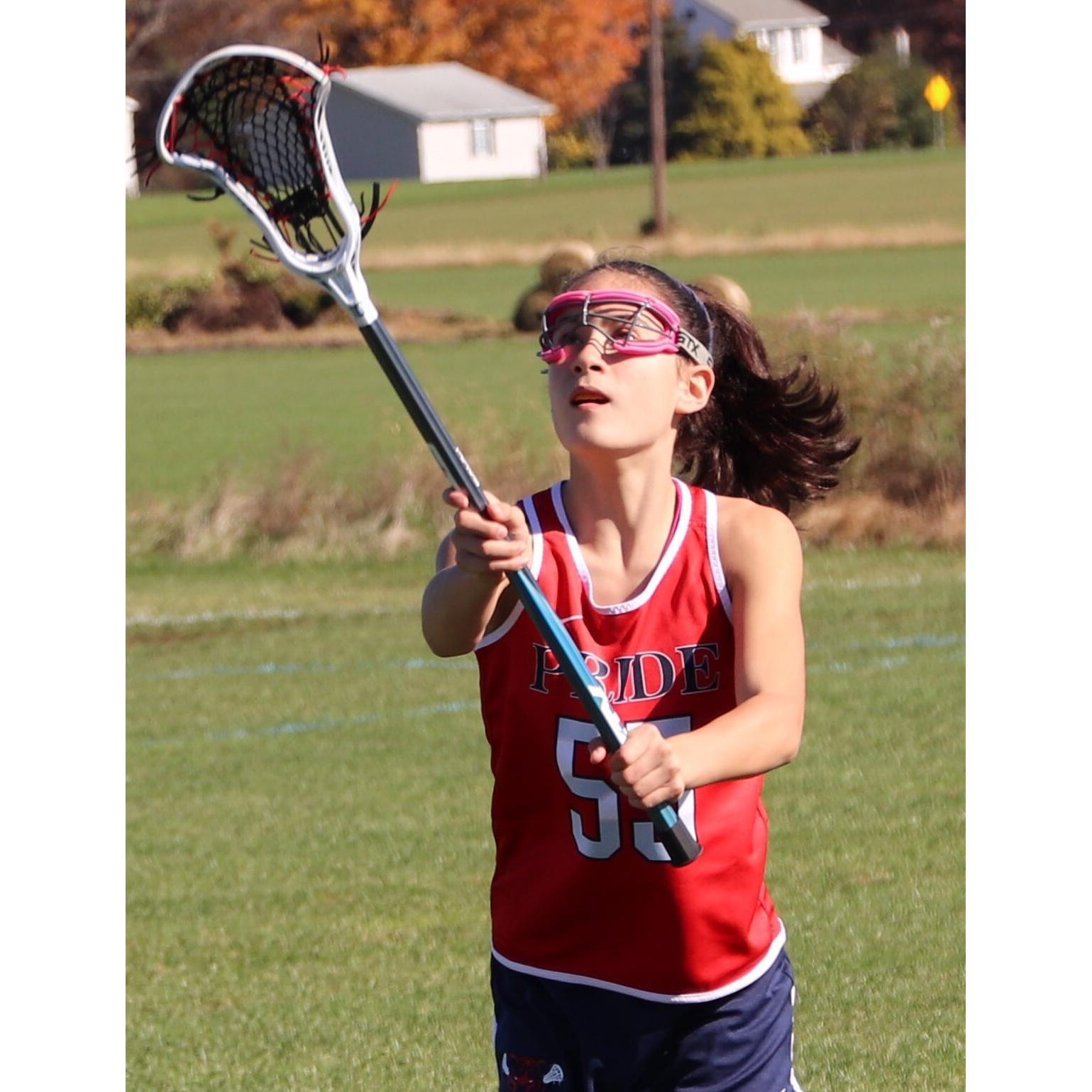 Gabby loves to play lacrosse.