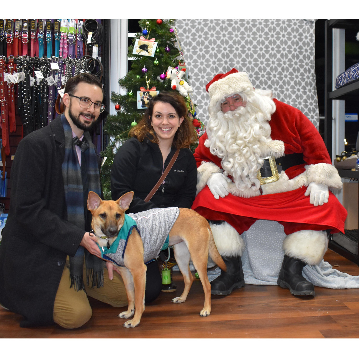 First Christmas with their dog, Ruby.