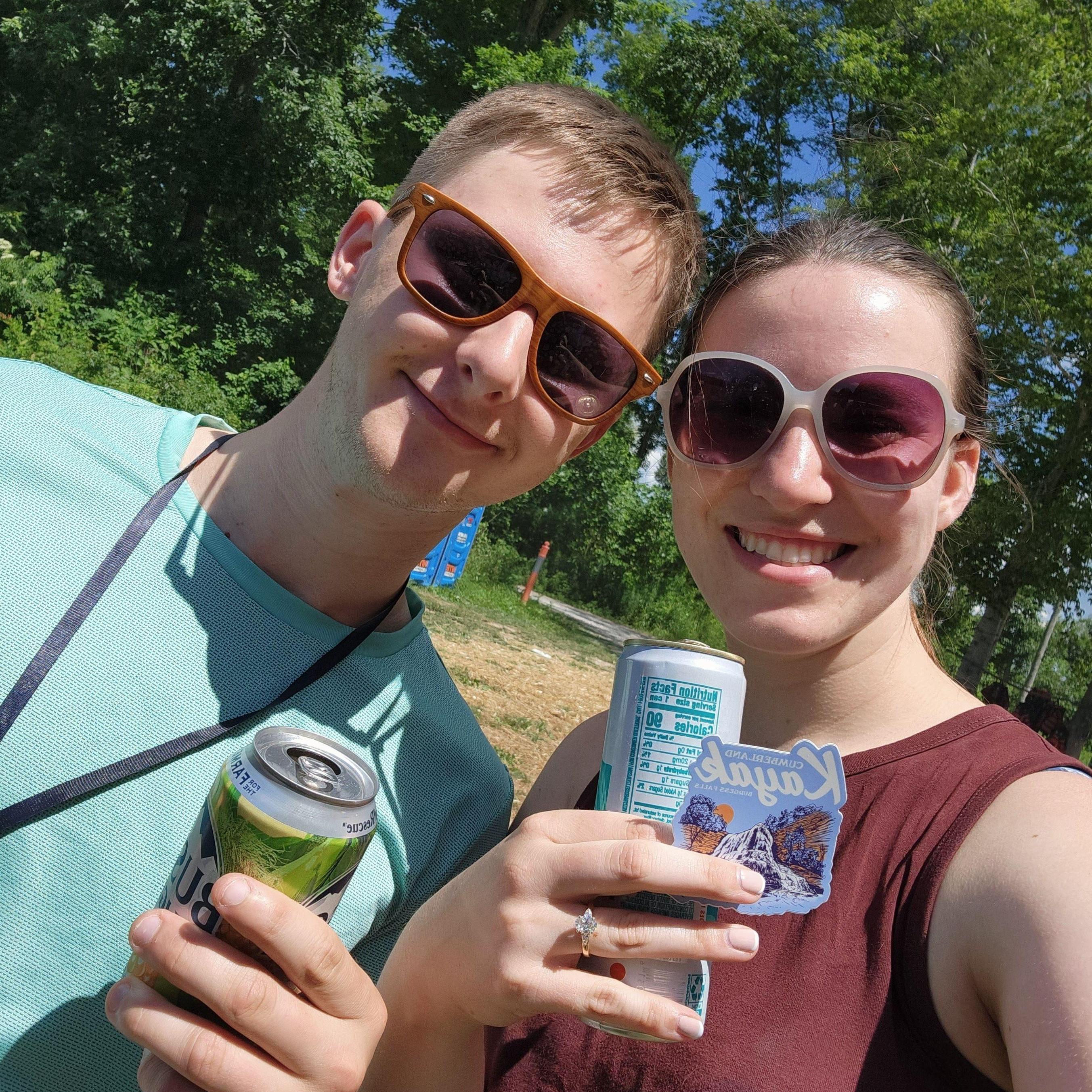 Celebrating the engagement after paddling back to shore