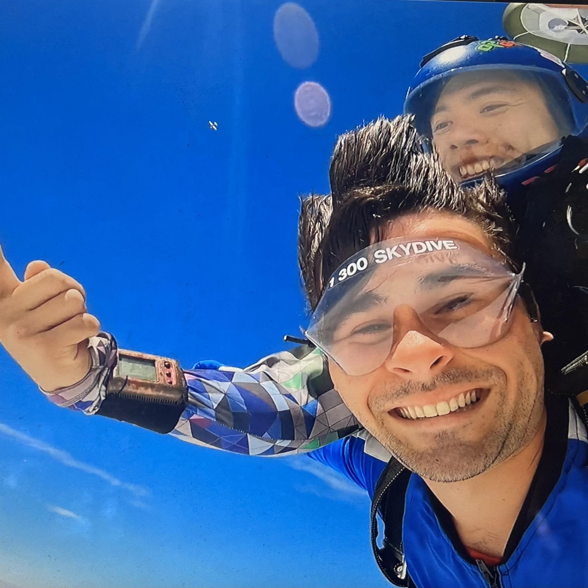 James geeking during his skydiving free-fall. This was before he threw up