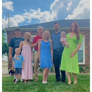 Family photo before graduation ceremonies.