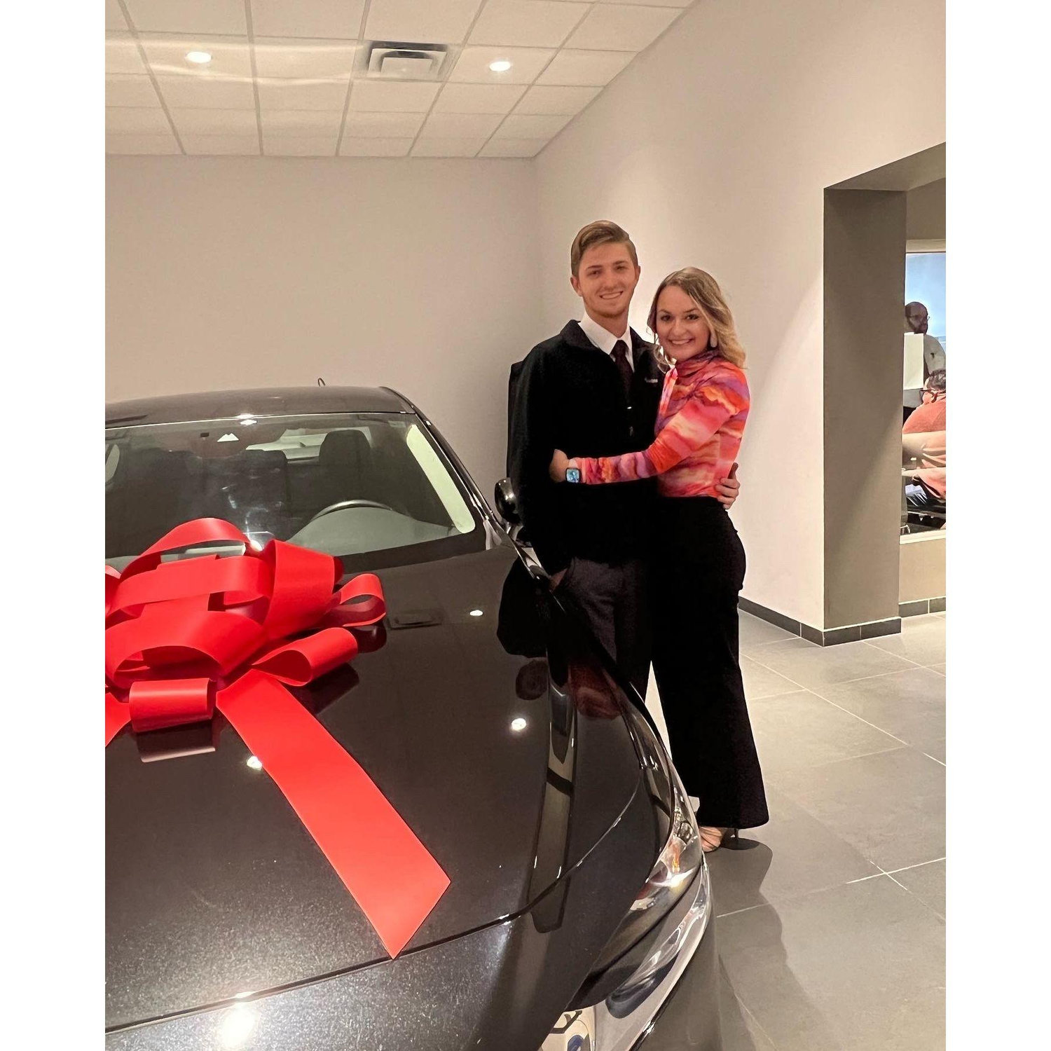 Colby helping Sam buy her first car, what a handsome salesman!