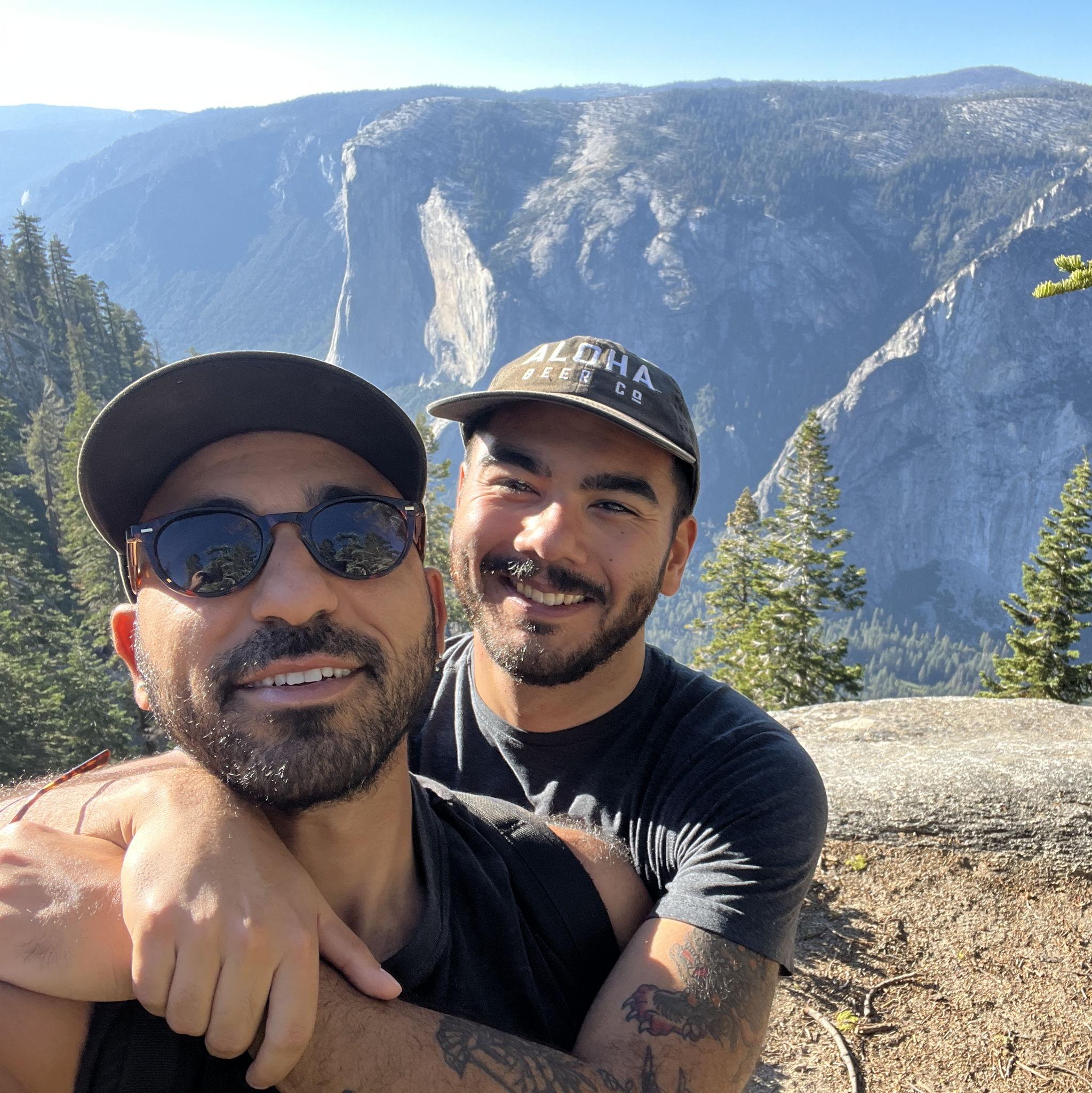 El Capitan in Yosemite National Park with almost matching hats.