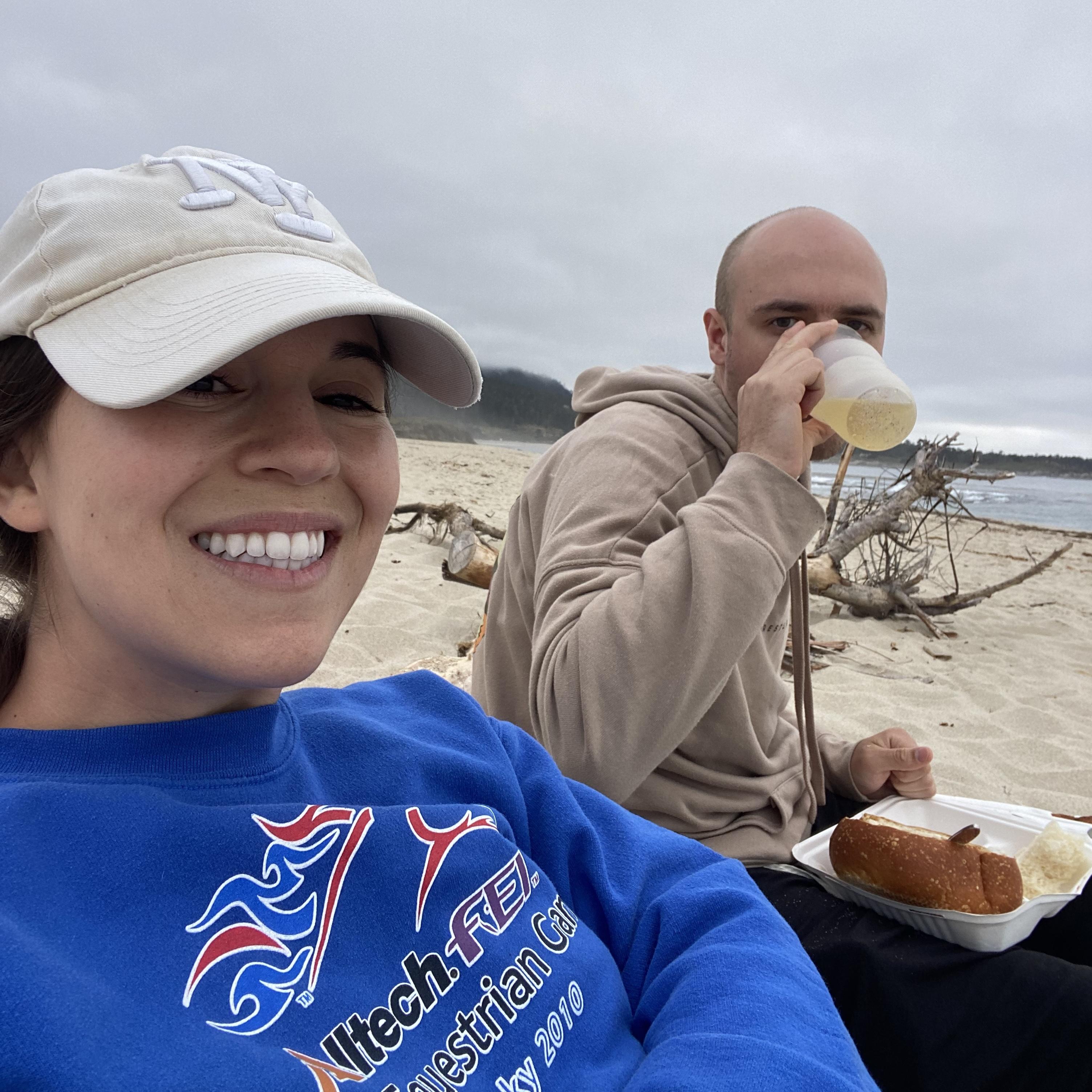 eating clam chowder in a bread bowl and drinking wine on the Carmel beach