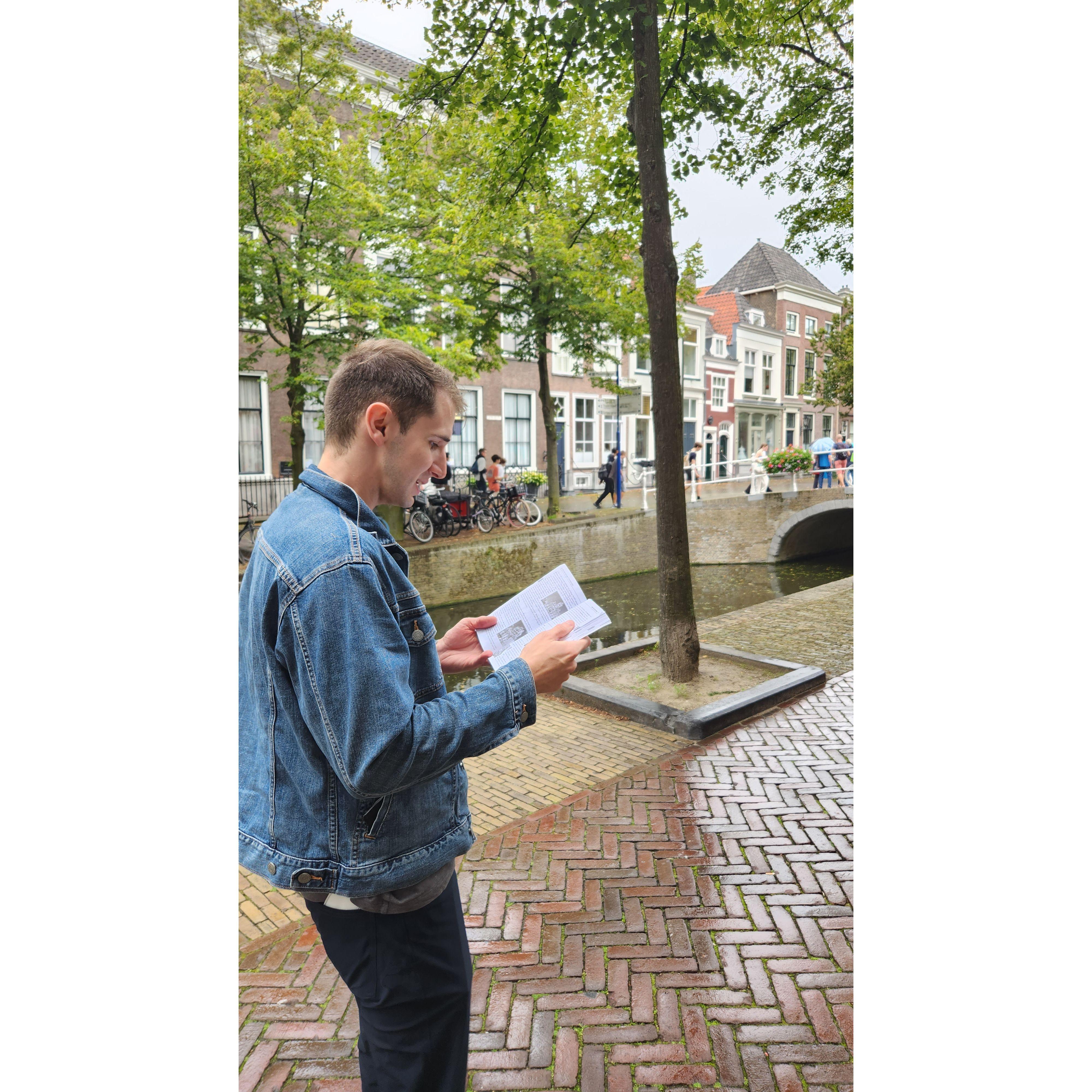 Reading from the "Book of Rick" in Delft. We are BIG fans.