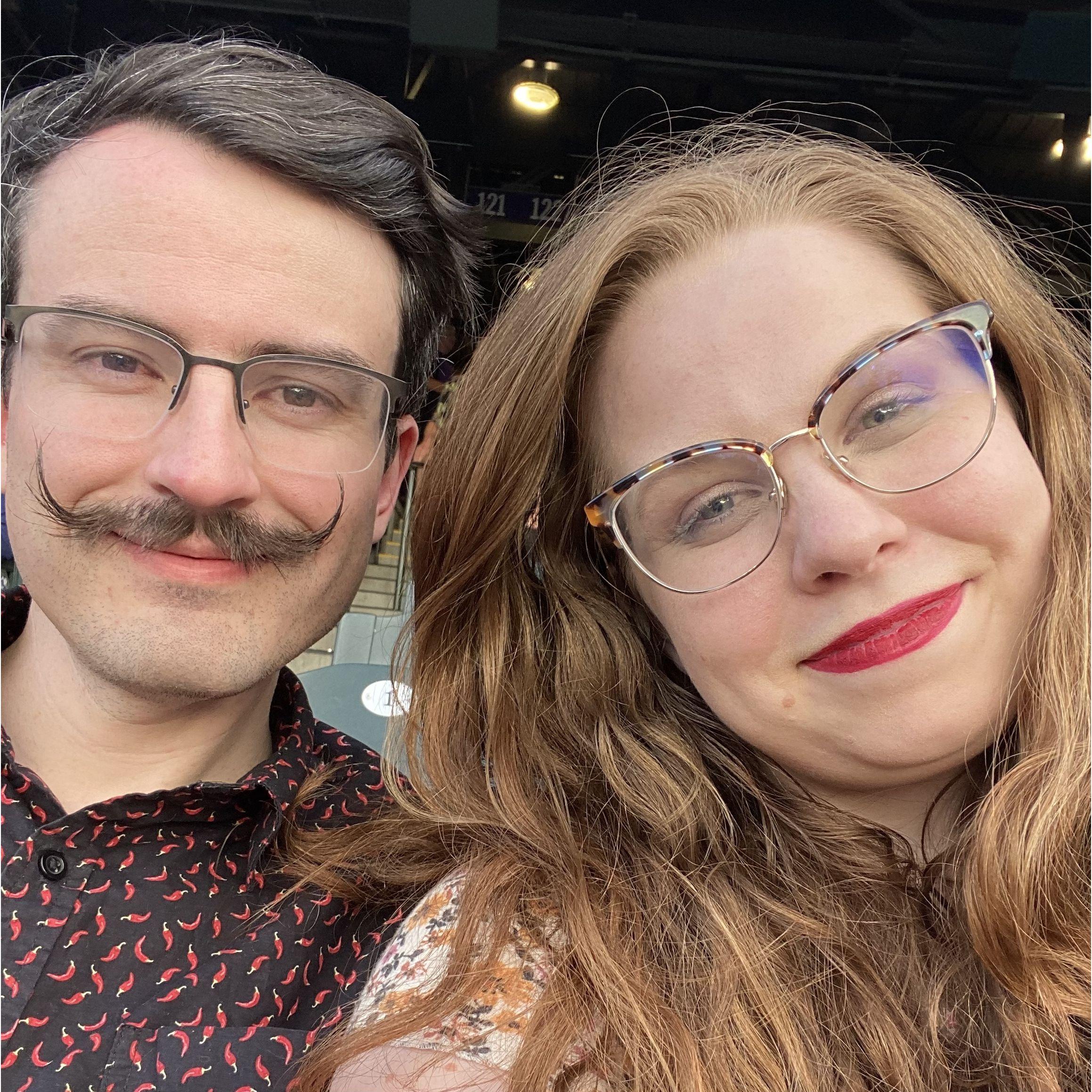 Hannah and Connor waiting to see Billy Joel live in concert. Yes he played "We Didn't Start The Fire", Yes the fire is still burning even though the World is turning.