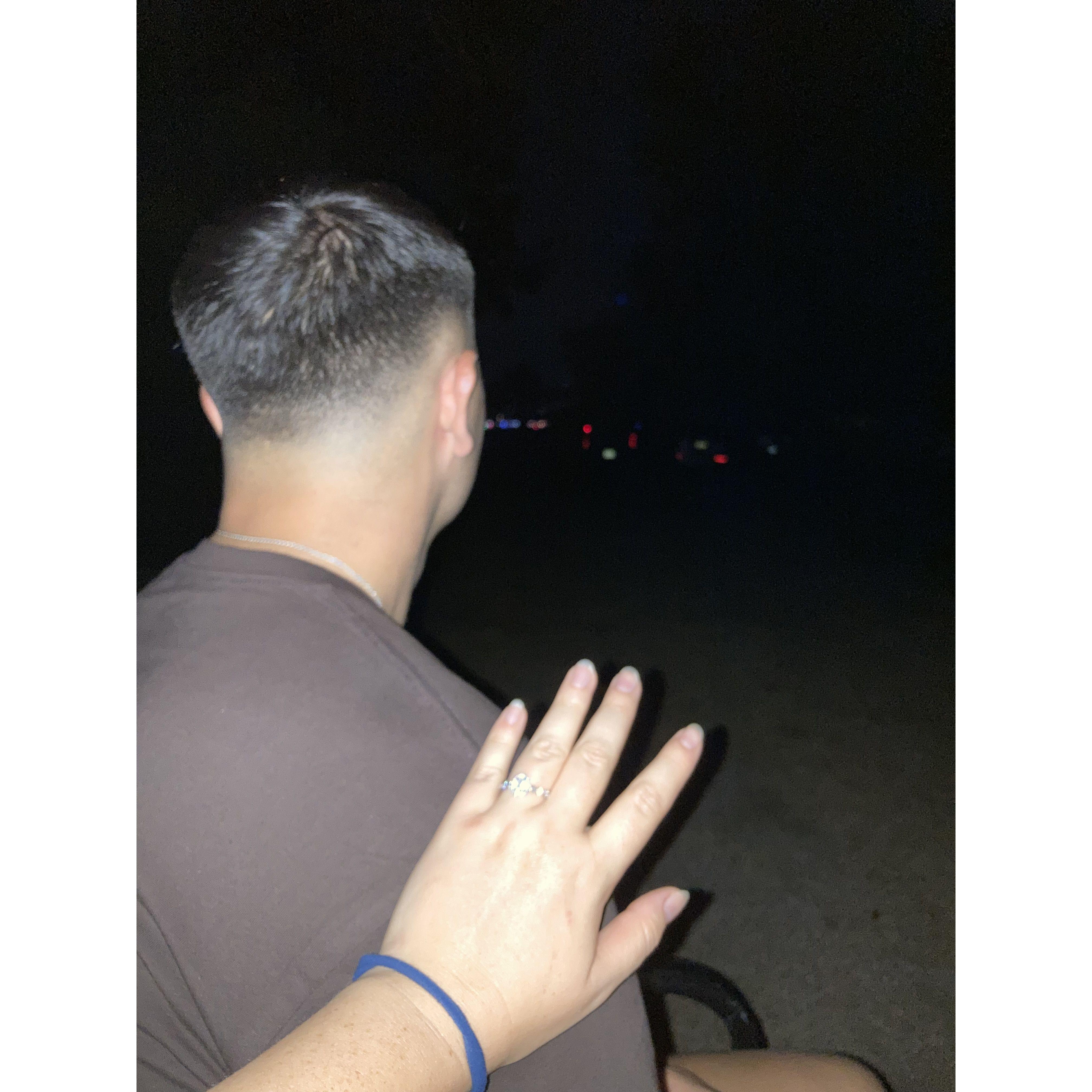 Watching fireworks after the proposal!