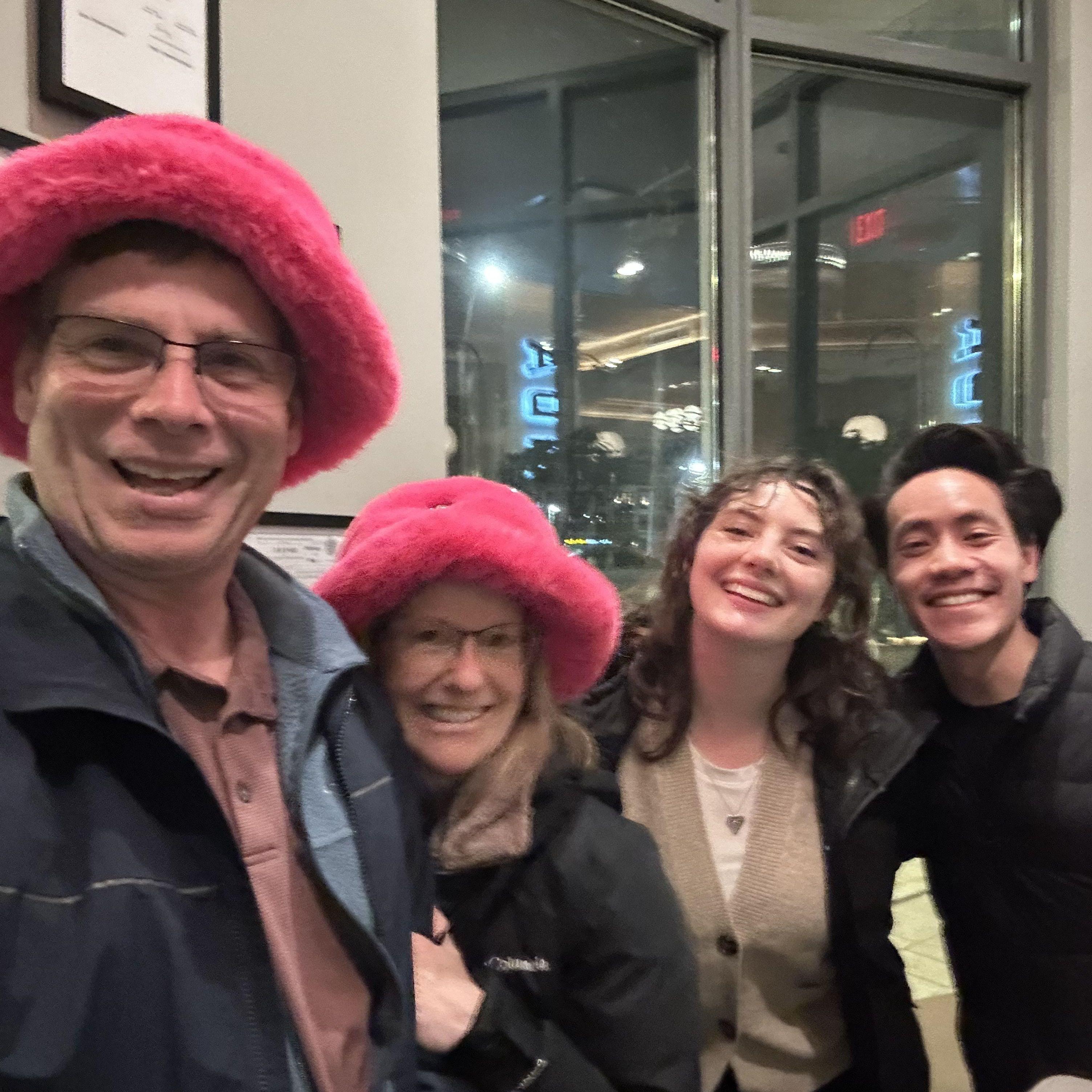 Pink hats with pasta dinner