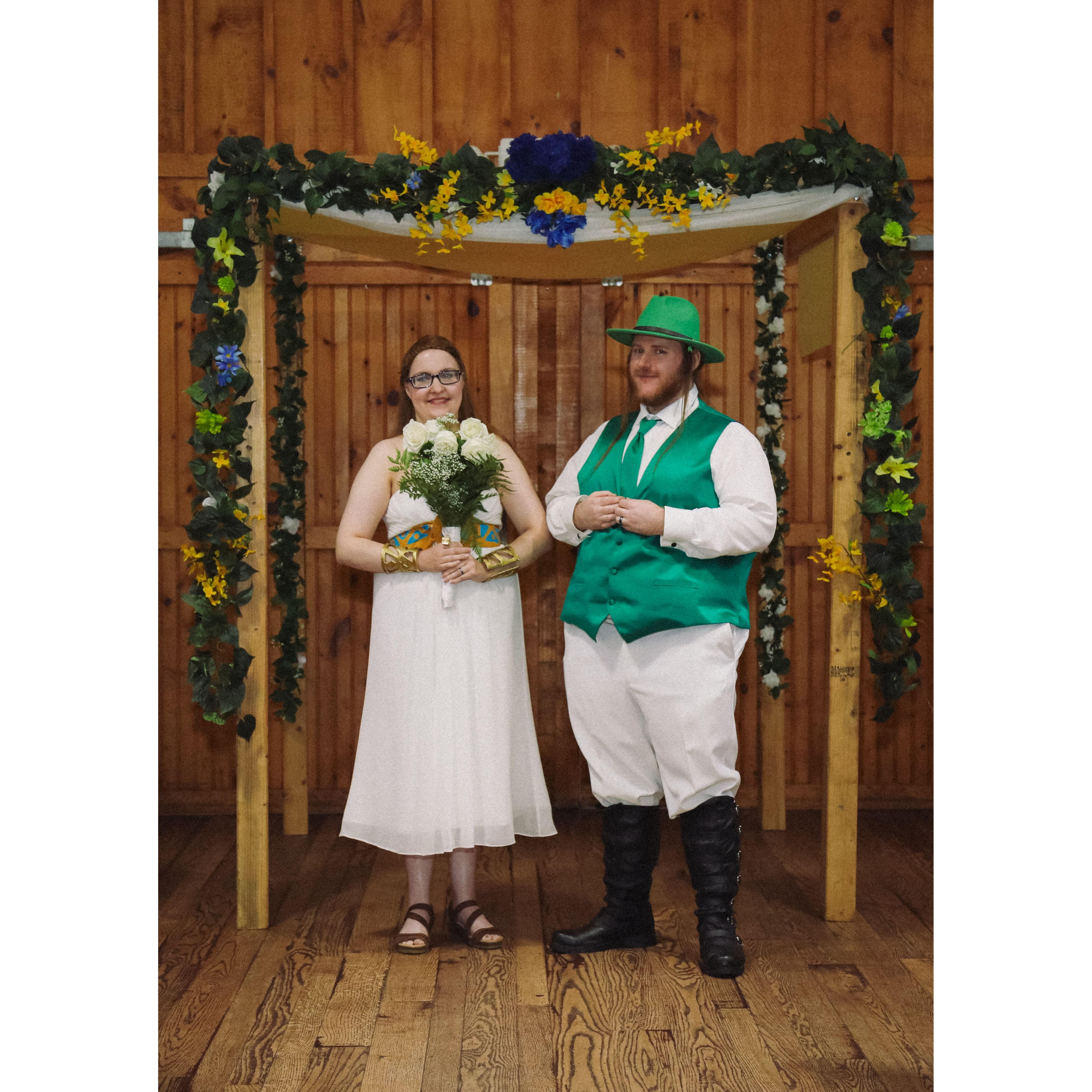 after the ceremony,  Sara and Herb under the arch