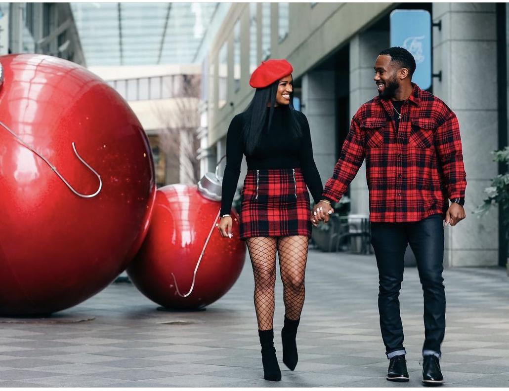 Our signature photo from our Christmas photoshoot in 2019 that Jermile’ convinced Rashad to do.