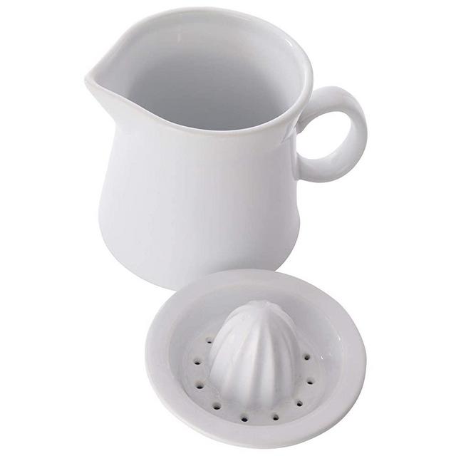 Ceramic White Fiddle and Fern Citrus Hand Juicer Including 20 ounce Pitcher Manual Fruit squeezer makes it easy to pour and drink
