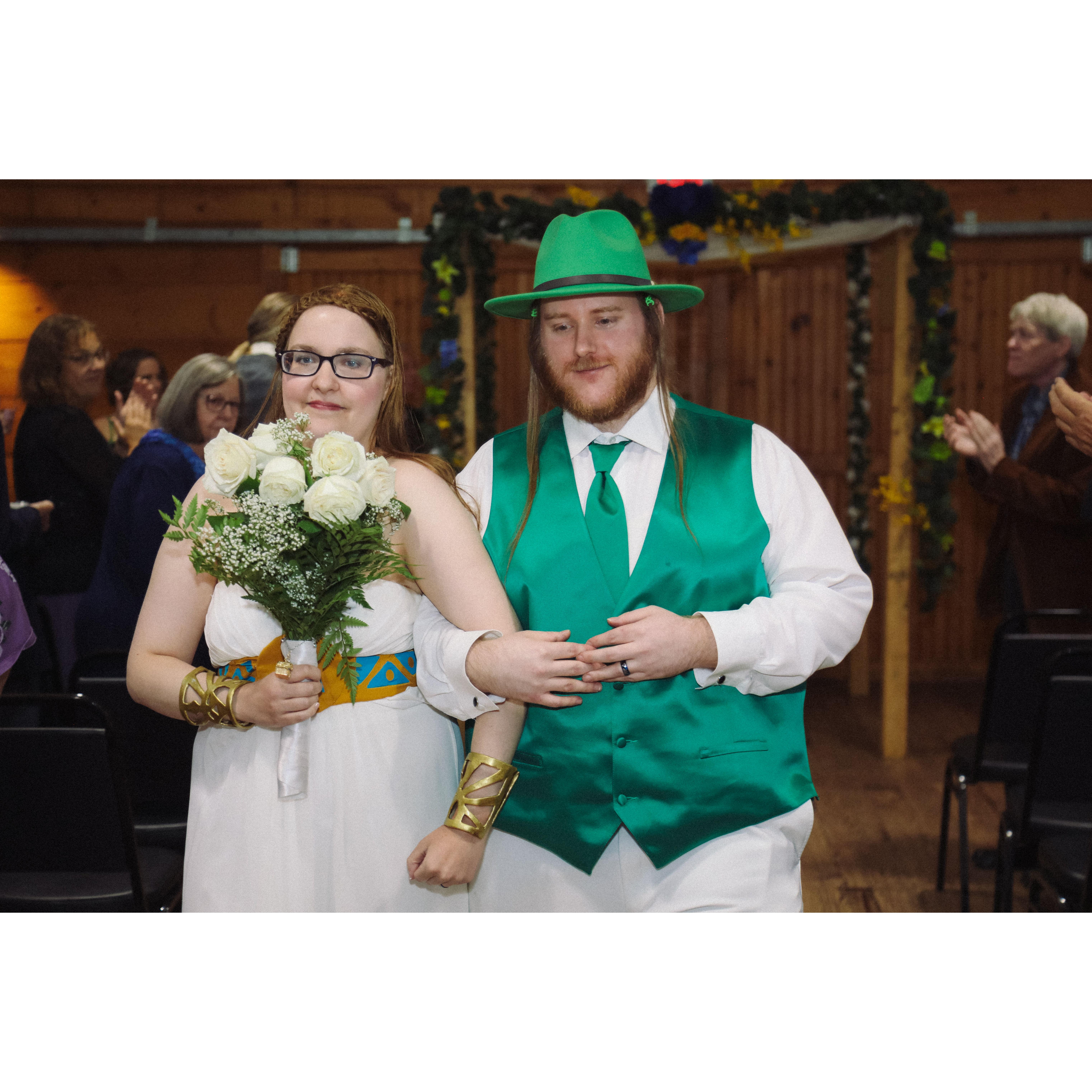 after the ceremony, Sara and Herb walking back up the aisle