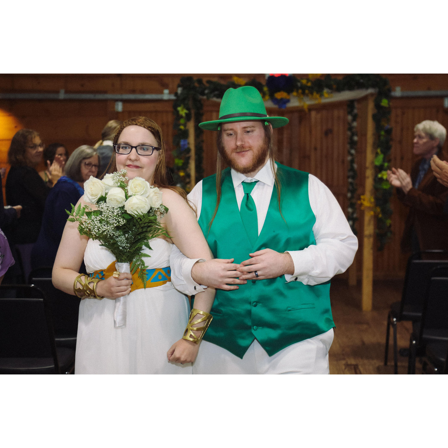 after the ceremony, Sara and Herb walking back up the aisle