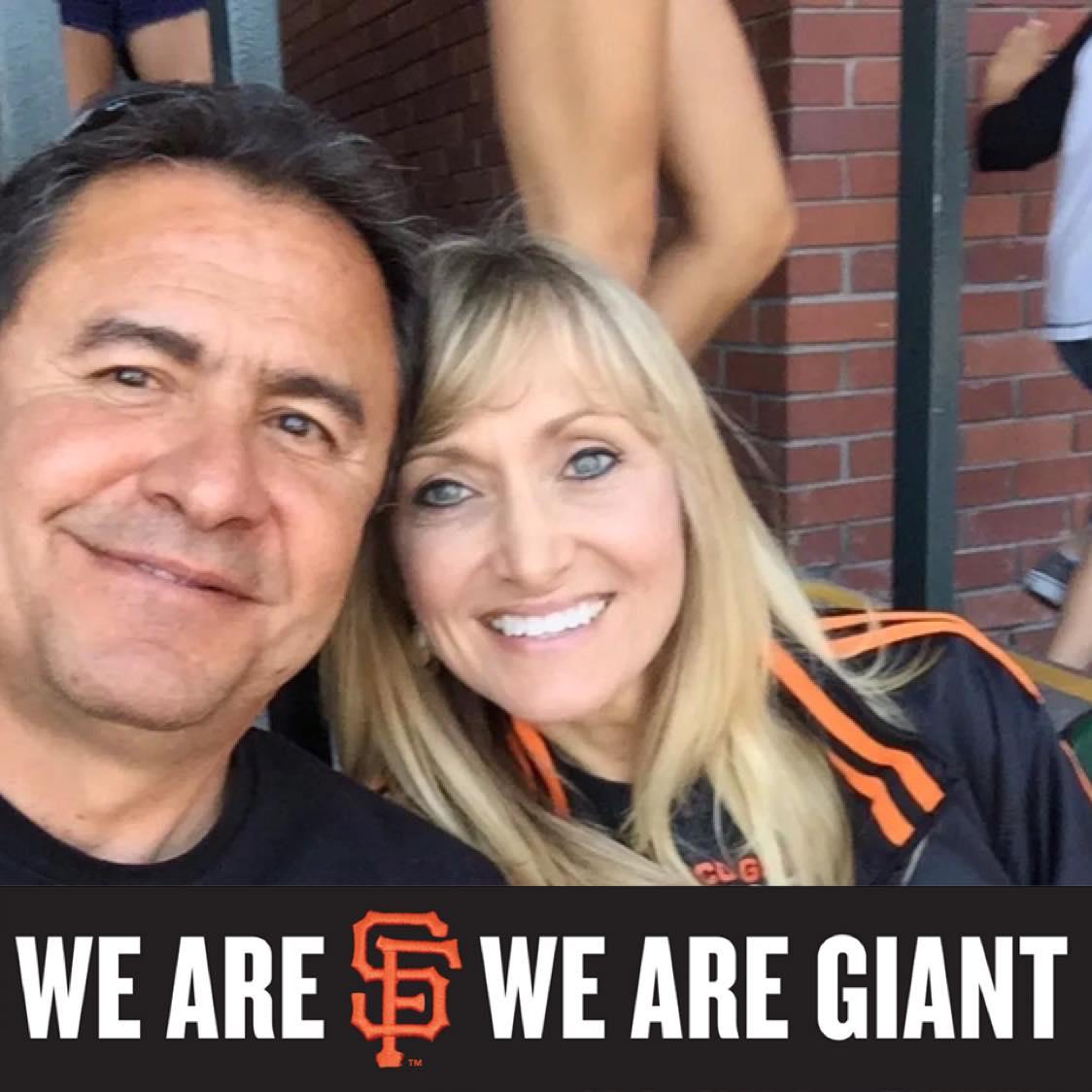 Two Giants fans enjoying our first live Giants game TOGETHER.