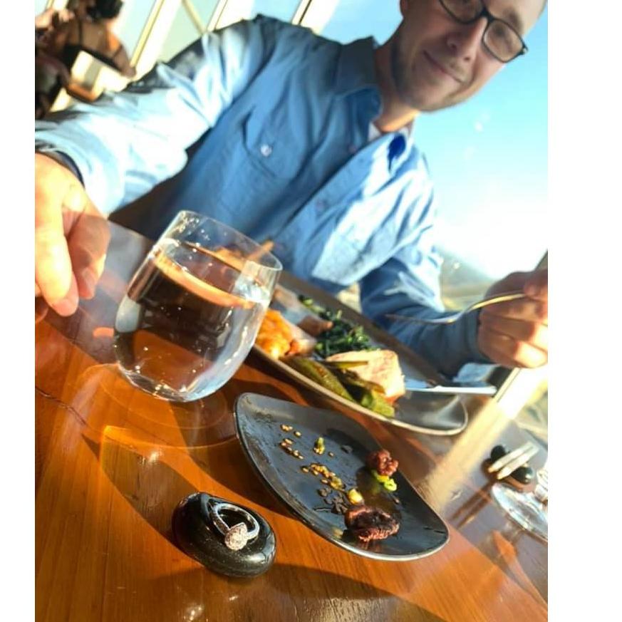 At dinner after the proposal. His face, that ring, that food *Swoon*