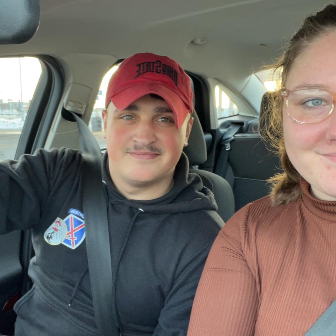 The couple did long distance for the first year of their relationship. This is their first time meeting in person!
