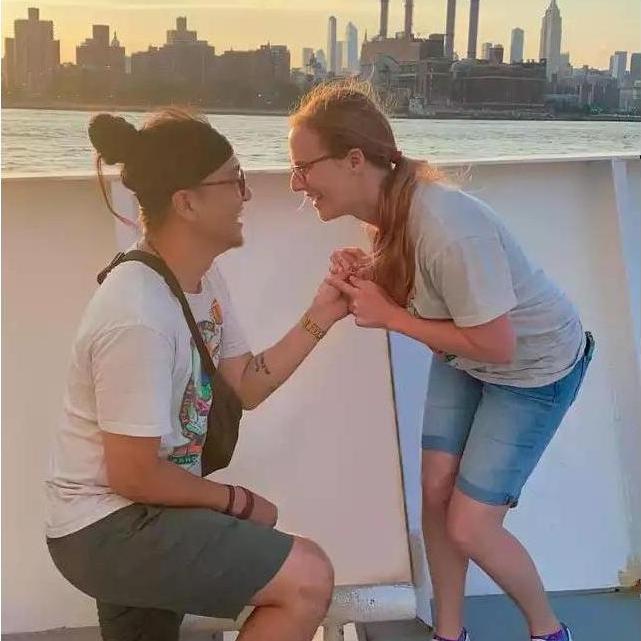 The moment of the engagement aboard the NYC sunset harbor cruise! Adam had a stranger take this photo. She did a super job.
