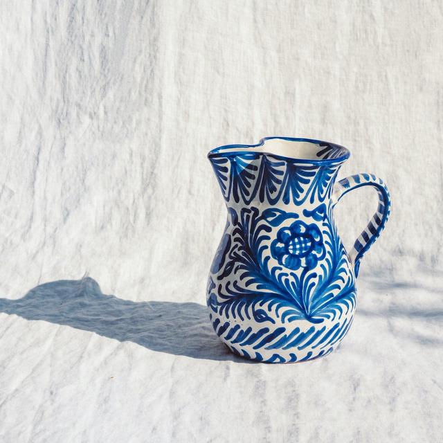 Medium pitcher with hand painted designs