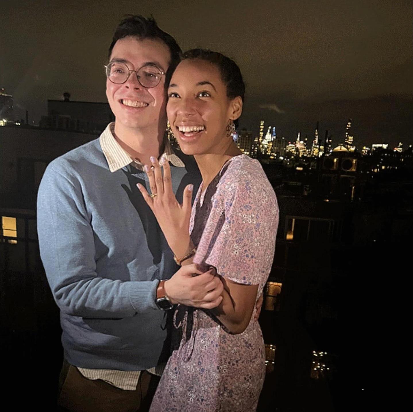 Posing on Chris's rooftop in Harlem the day we got engaged!