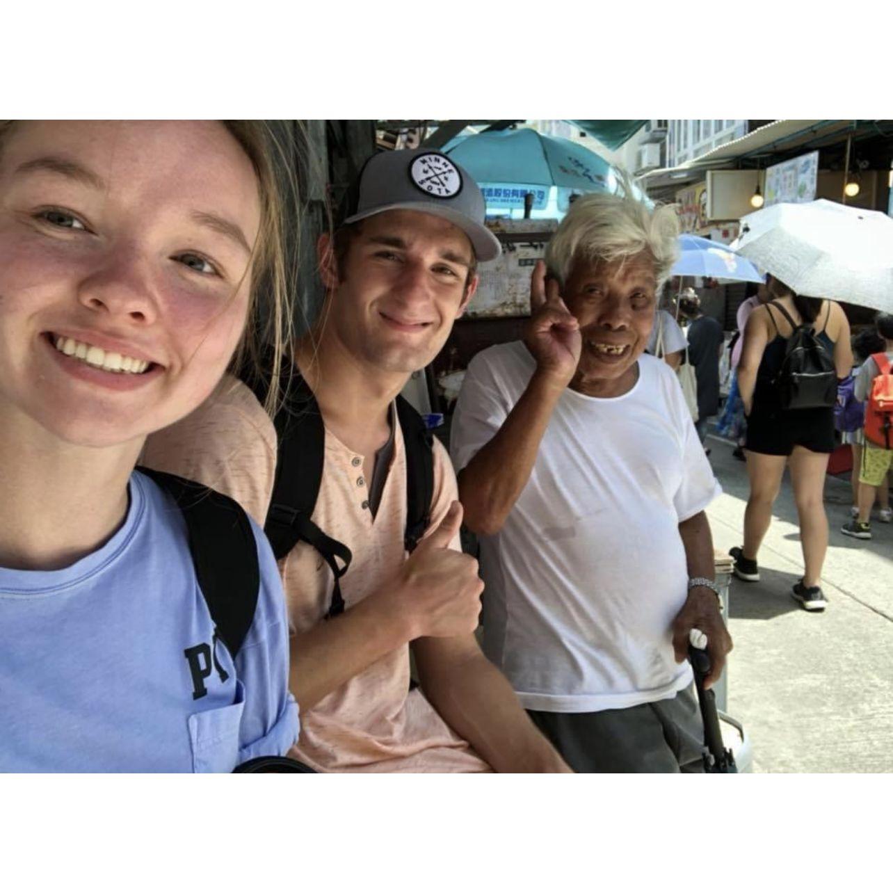Erin and Killian exploring Hong Kong, and making friends with a local!