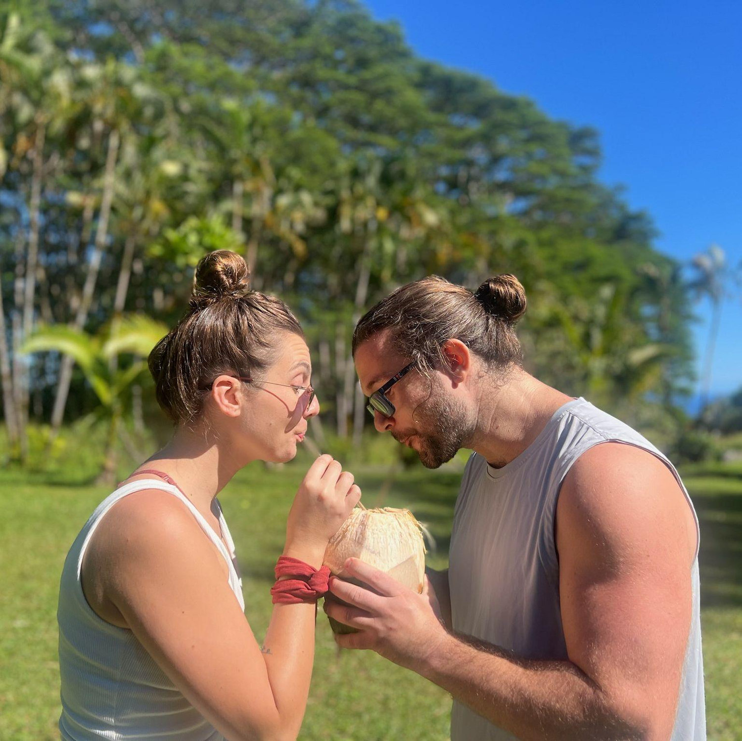 Sippin coconuts in Hawaii