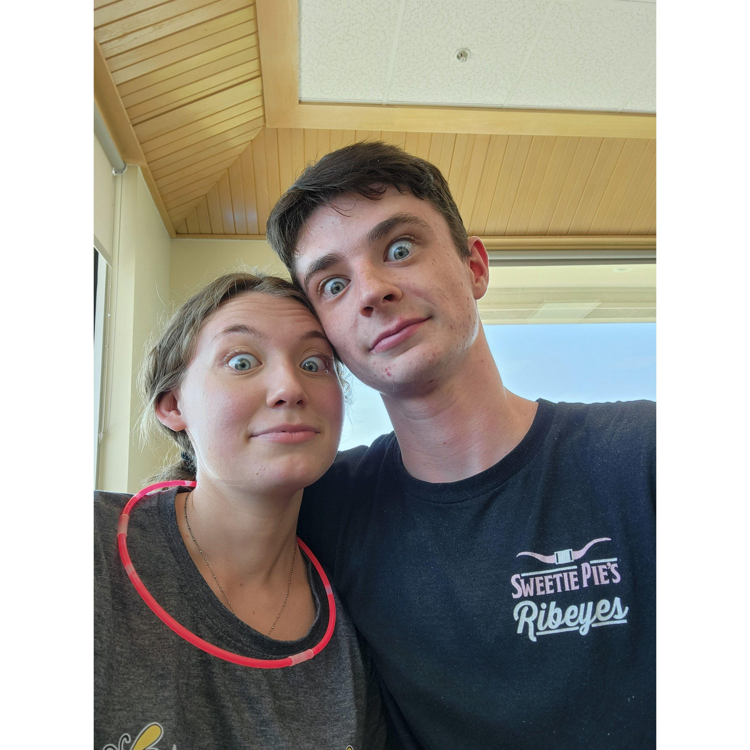 Shenanigans before work. You may notice the same necklace from the mall! After beating me so brutally in putt putt he won this necklace, a token which we exchange often.