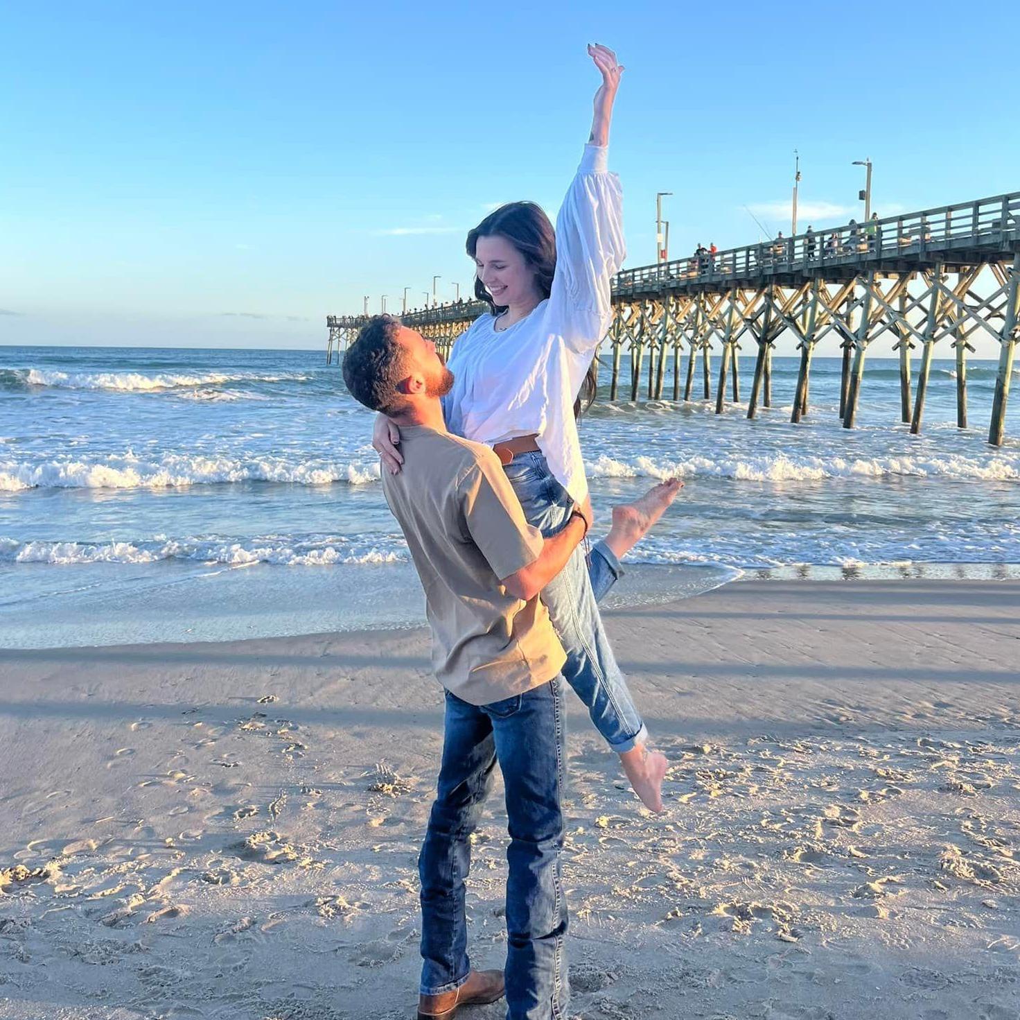 OMG we are getting married - Back at Buddy's on the beach the place we first met.