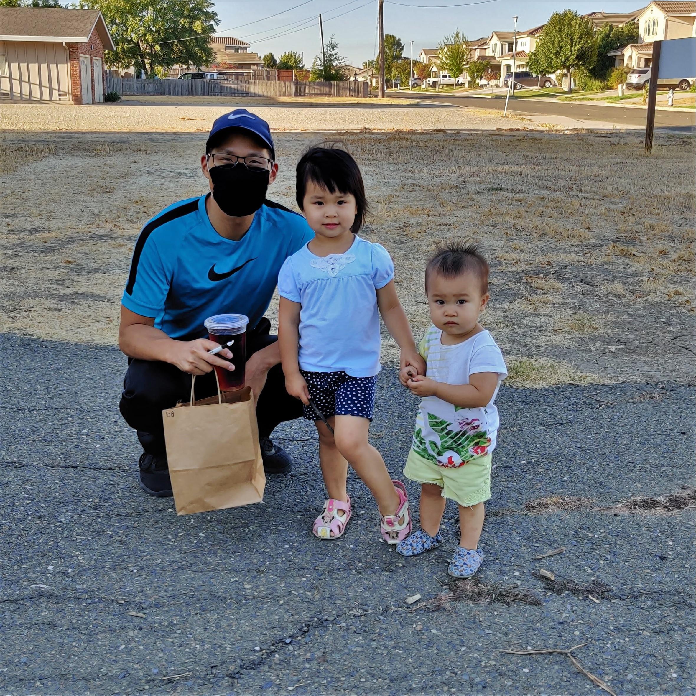 Charissa and Josephine wishing uncle Tim luck before the proposal