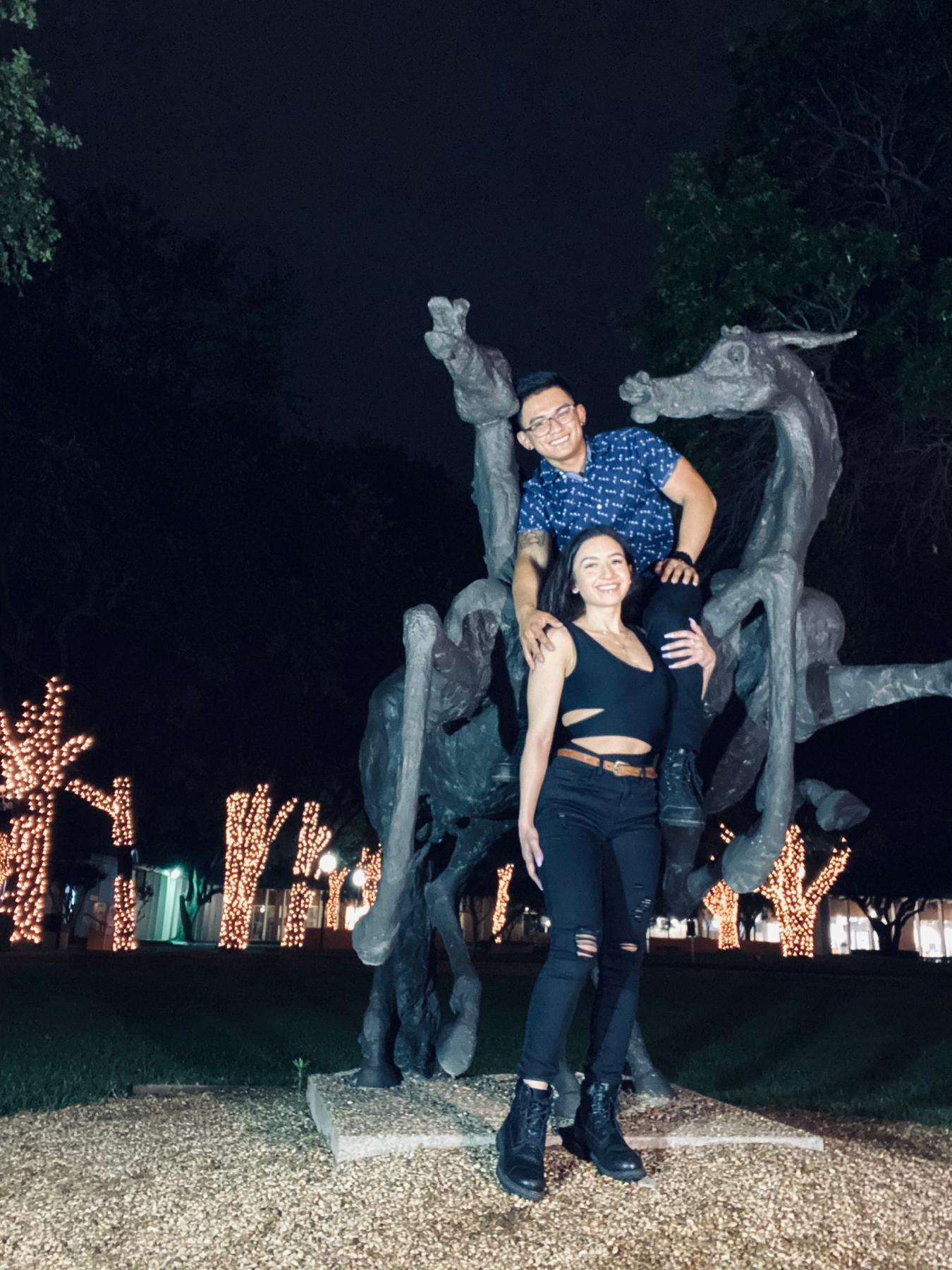 Our first fancy date night in Dallas. We saw this statue and Lawrence wanted to take pictures together