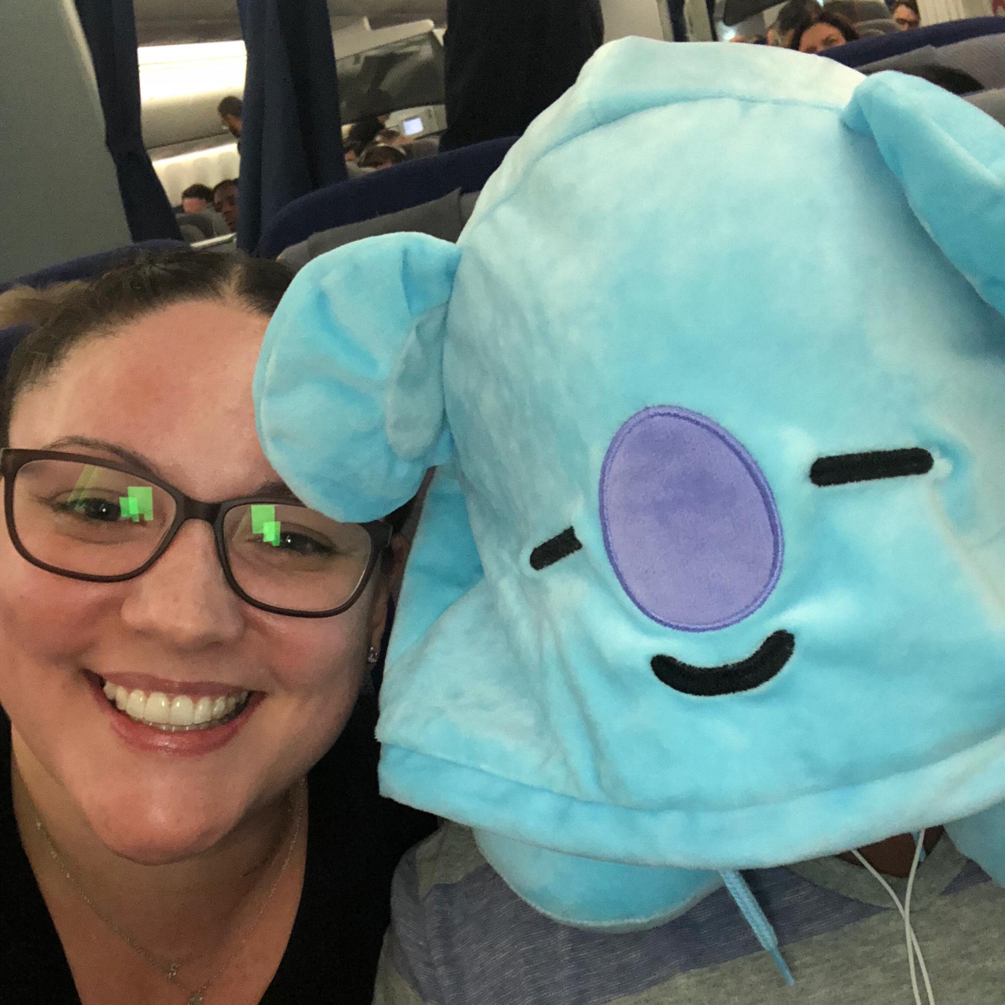 I was smart enough to bring a neck pillow for our 24 hour flight to India - he was smarter and stole it from me.