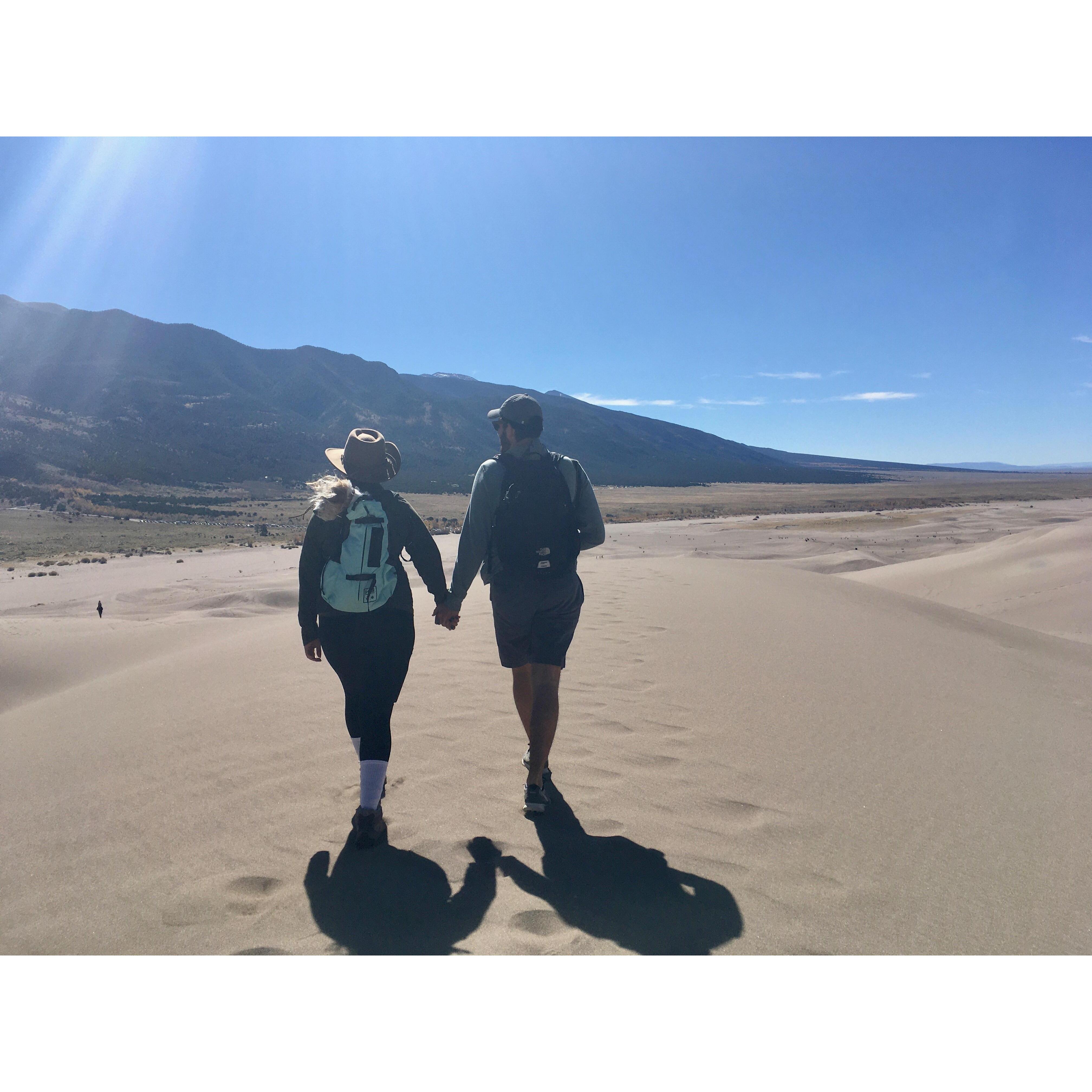 Walking through Great Sand Dunes National Park and Preserve in Colorado with Annie in tow.