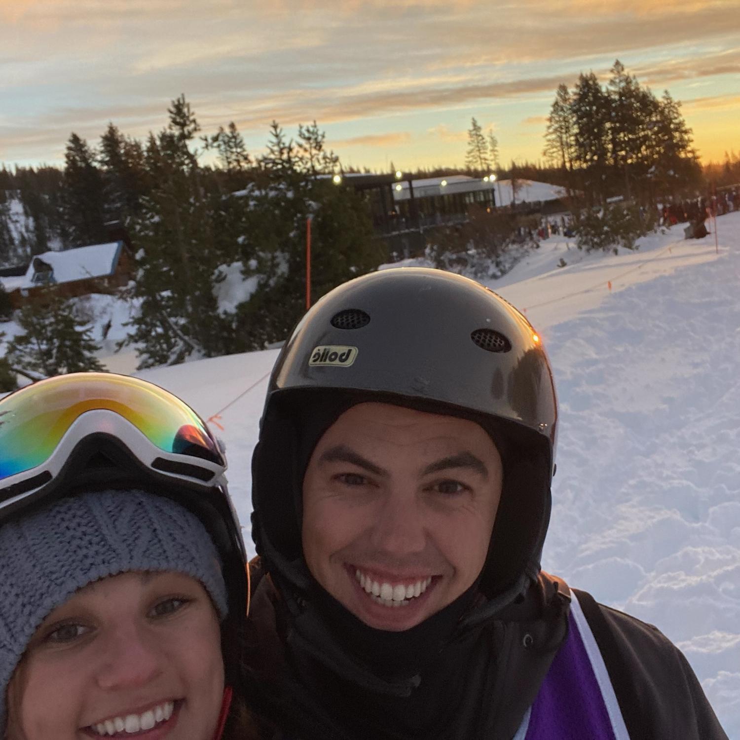 Michael teaching Sammy how to snowboard.