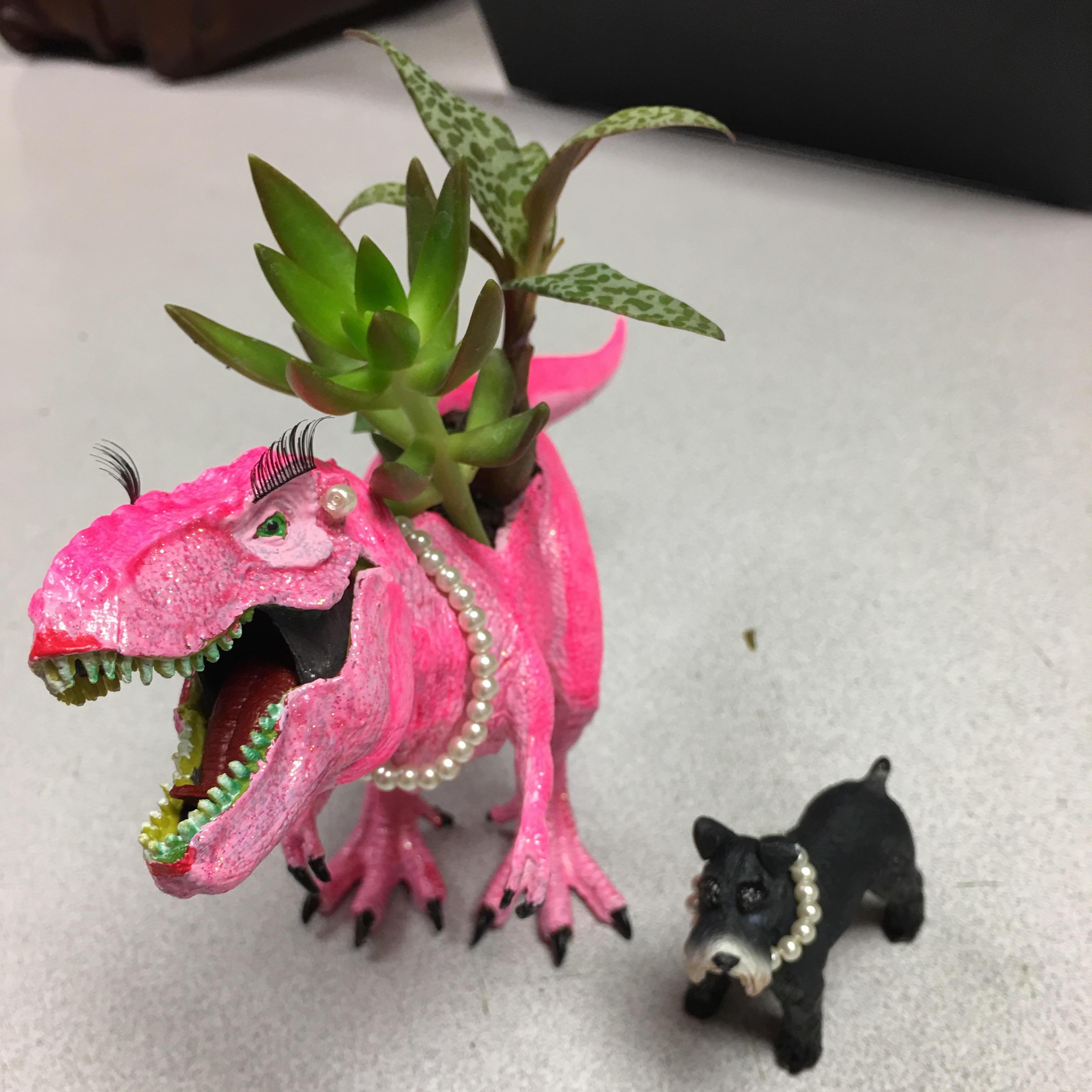 Dino Succulent and Miniature Schnauzer sidekick featuring matching Mikimotor pearls and those red soled shoes made by Ryan after he refused to pay 20 bucks for a crappy one in Austin for me.