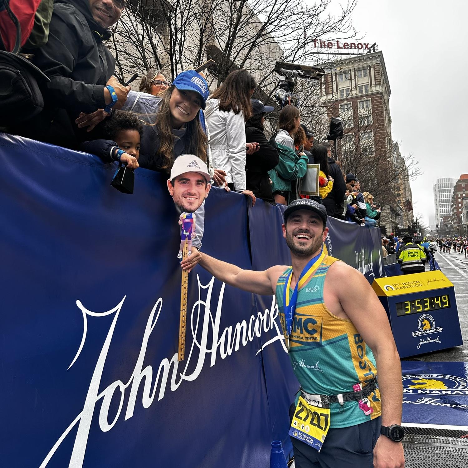 Johnny finishing the Boston marathon